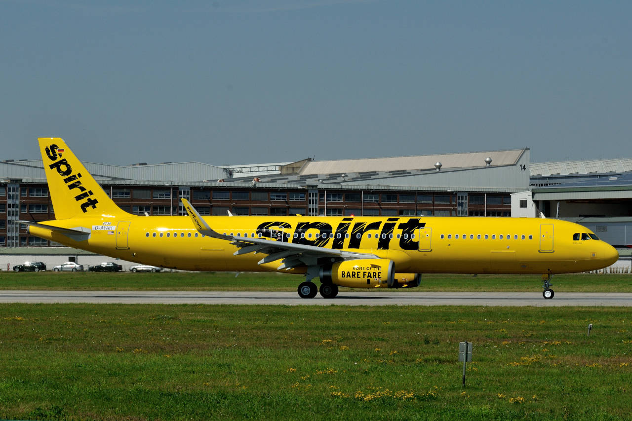 Spirit Airlines Plane On Airport Background