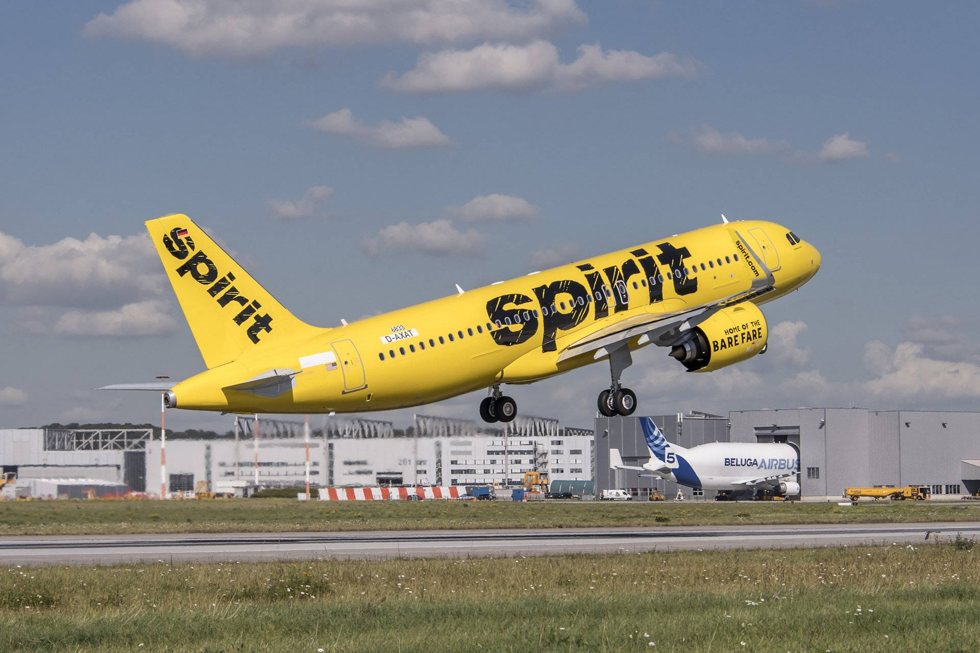 Spirit Airlines Yellow Plane Take Off Background