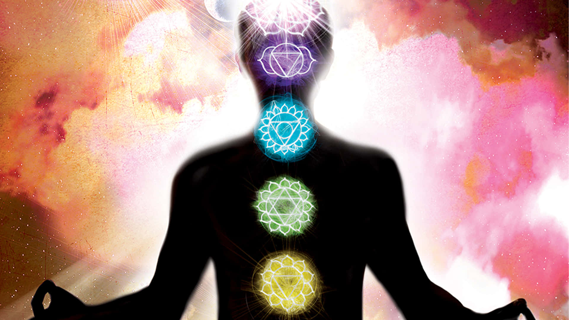 A Man In Yoga With Seven Chakras Wallpaper