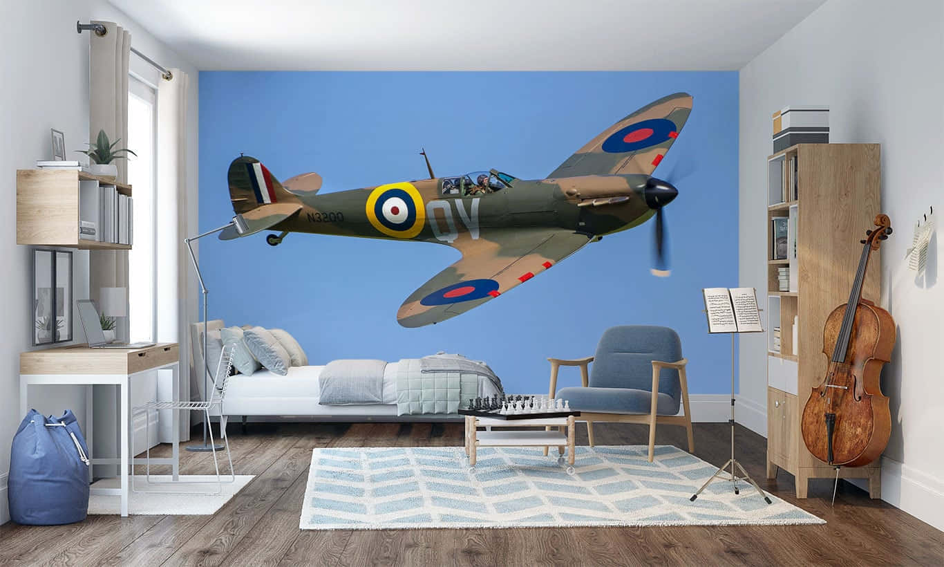 Unahabitación Con Un Mural De Pared Del Spitfire Fondo de pantalla
