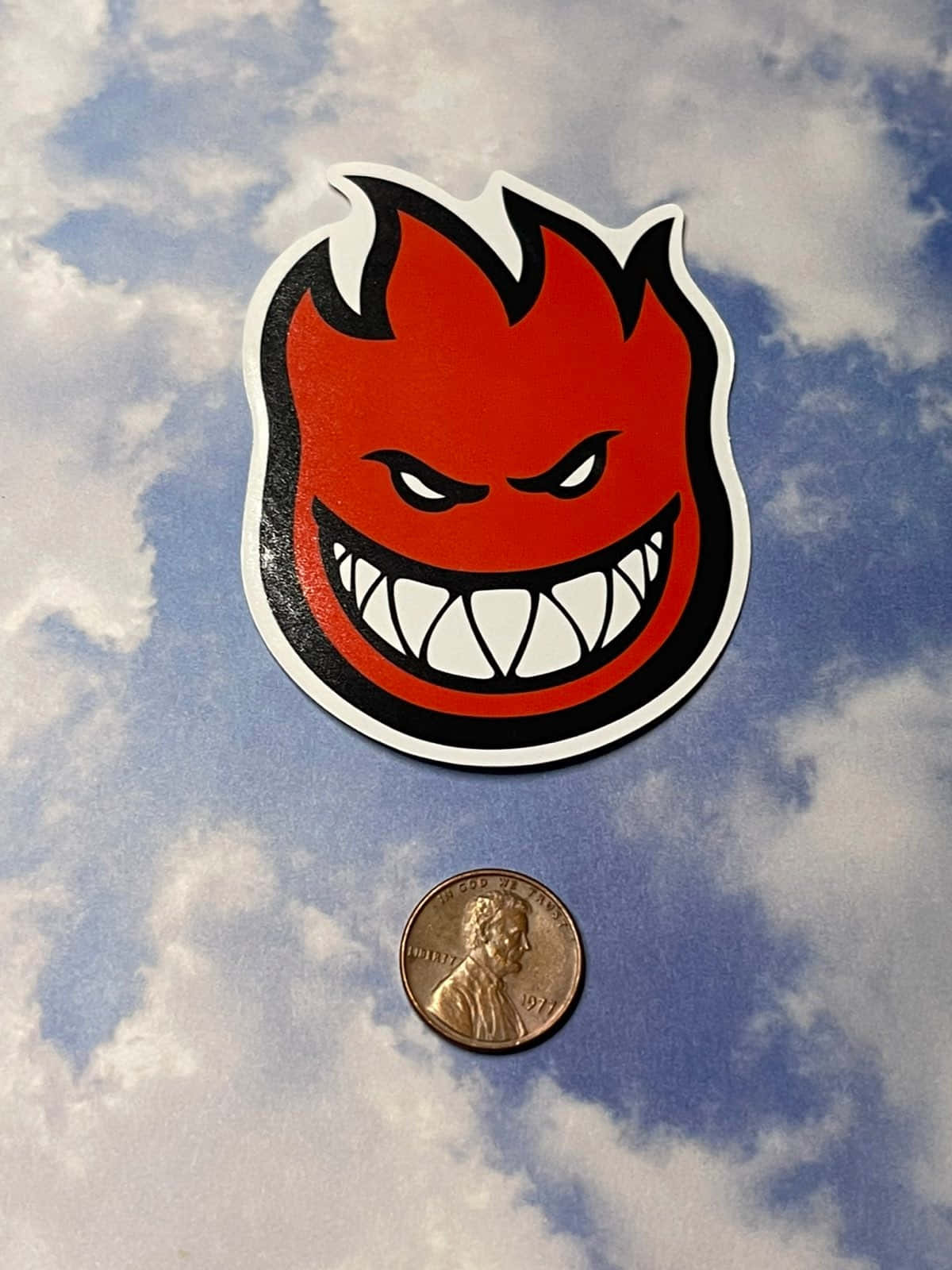 Spitfire Skate Sticker And A Coin Wallpaper