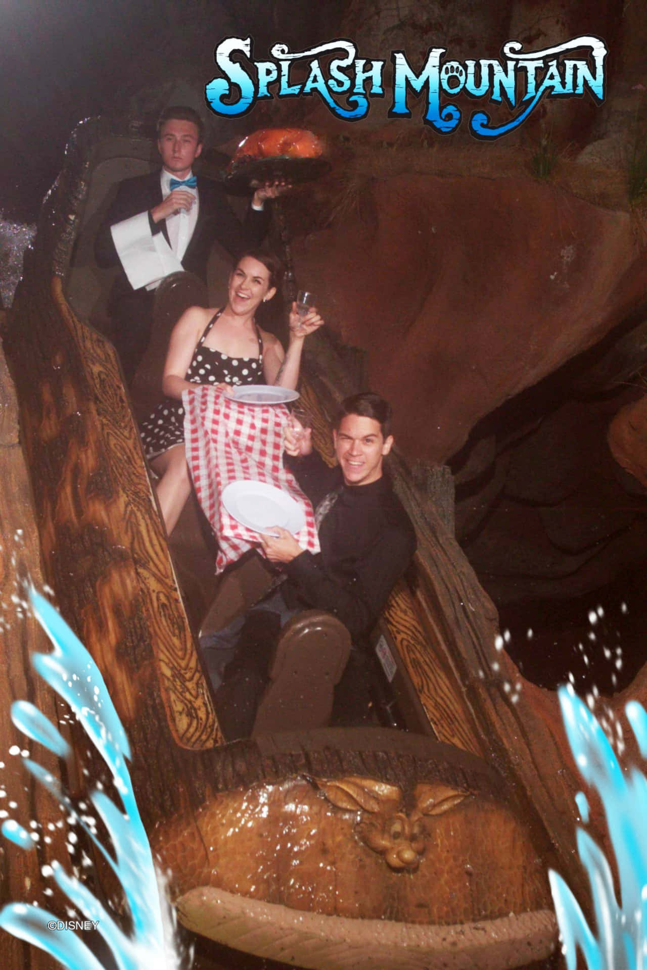 Splash Mountain - A Group Of People On A Ride