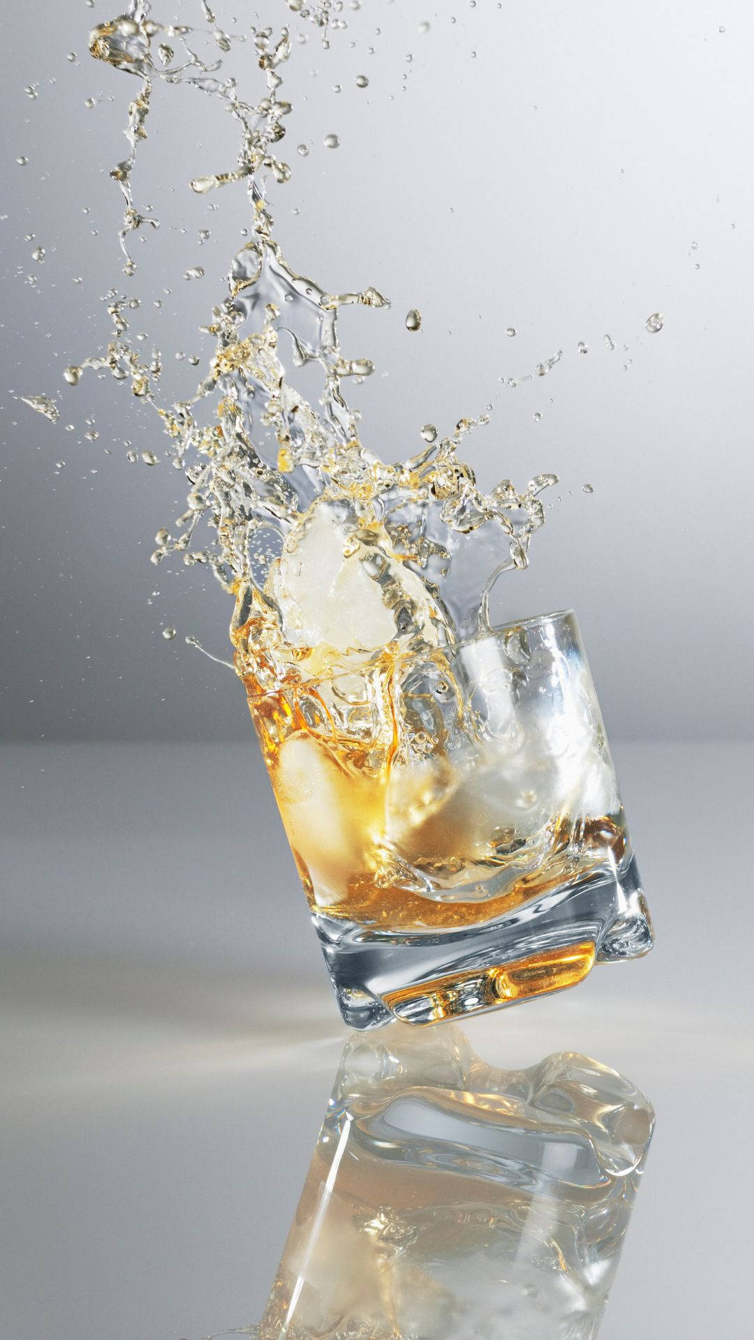 Splash Of Alcohol In Shot Glass Wallpaper