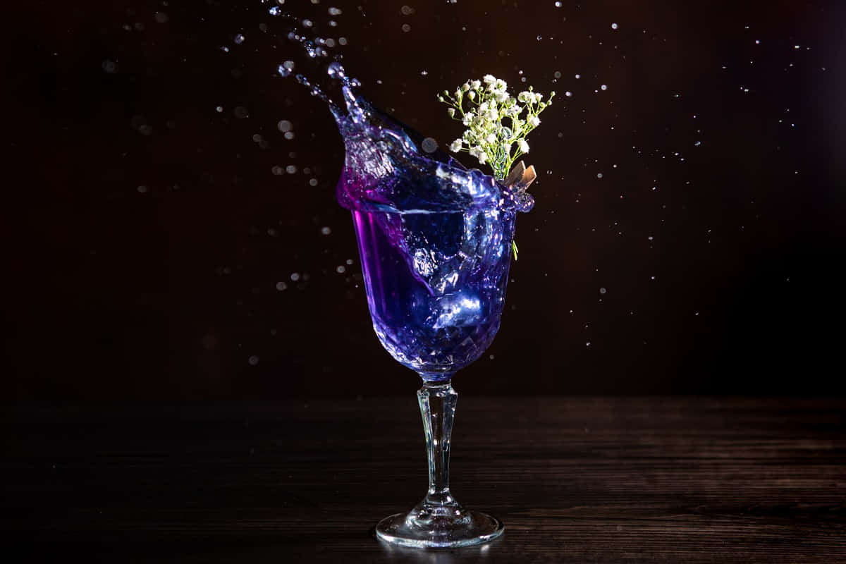 Splashing Blue Cocktail Drinks Glass Wallpaper