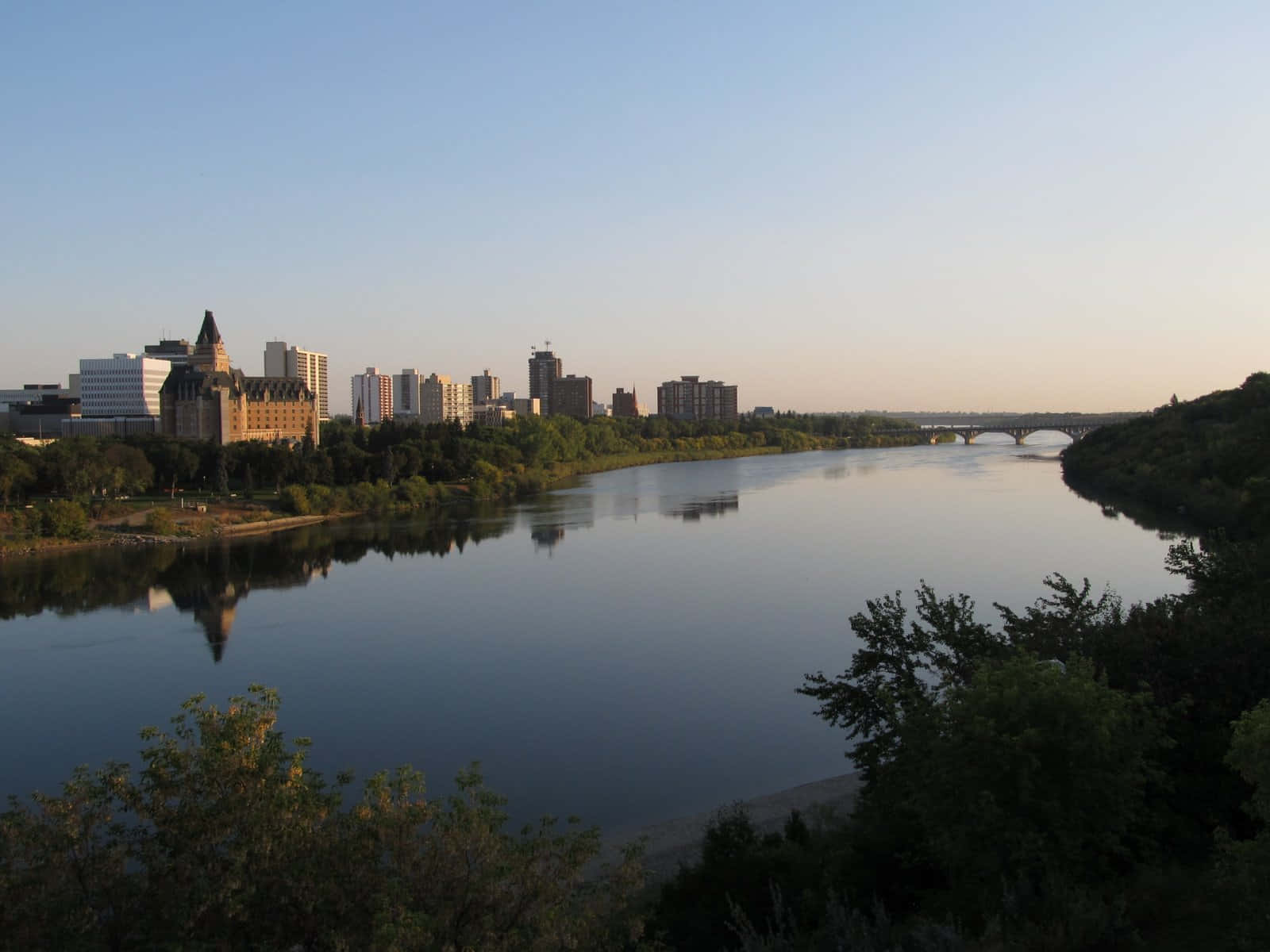 Splendid Sunset Over Saskatoon Cityscape Wallpaper