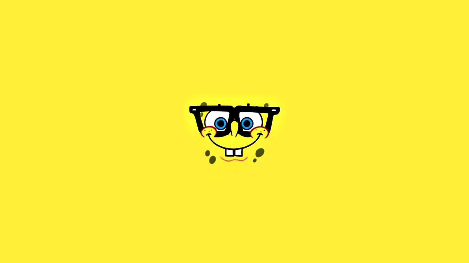 Bring some fun to your day with this cheerful Spongebob Face wallpaper! Wallpaper