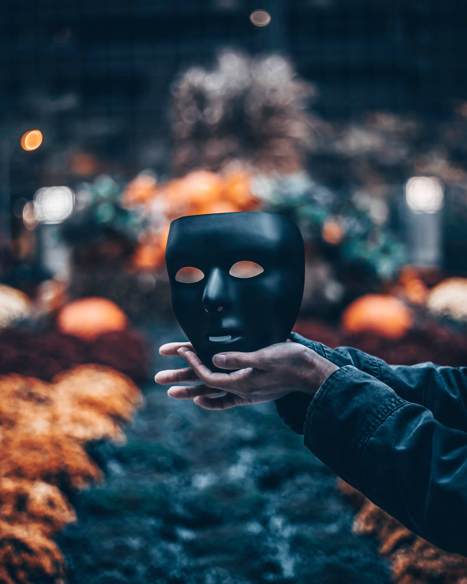 Spooky Black Mask In Hand