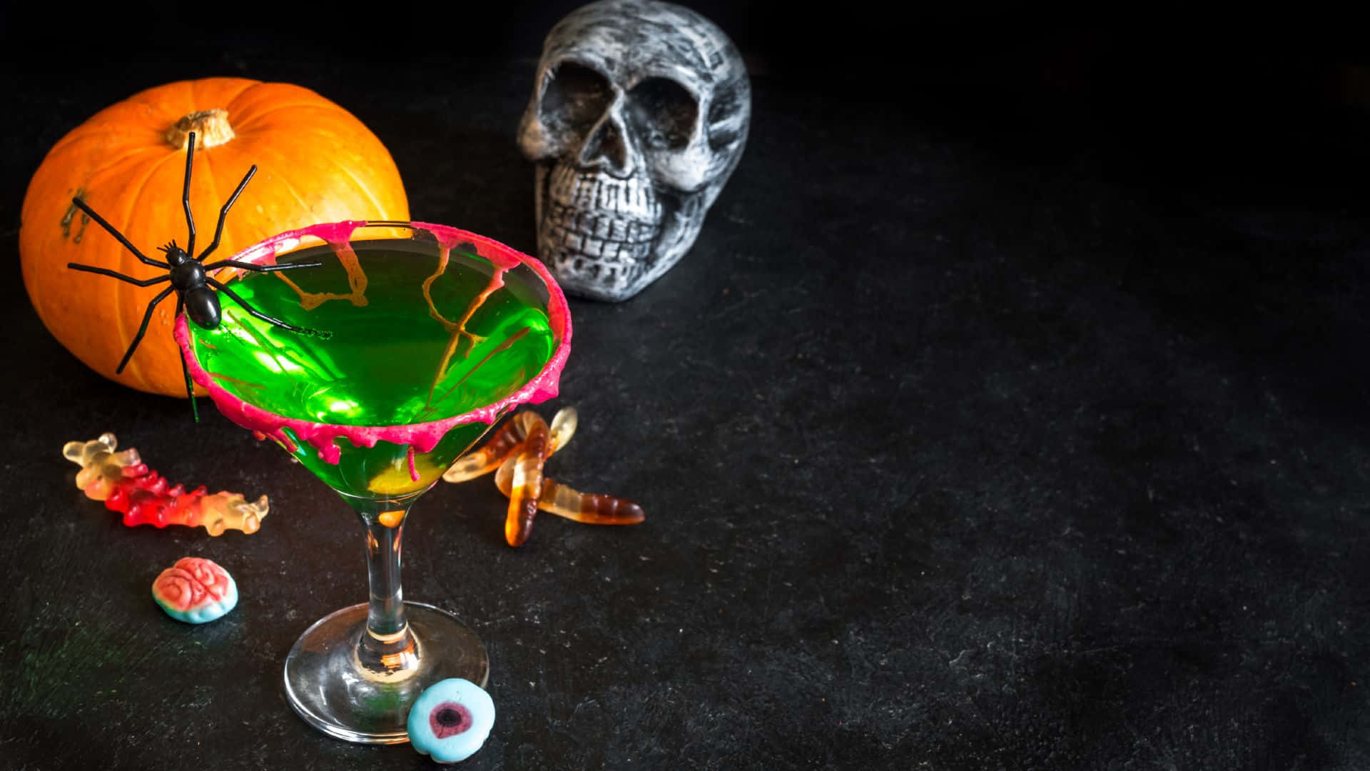 "Grab your spookiest glass for some spooky cocktails!" Wallpaper
