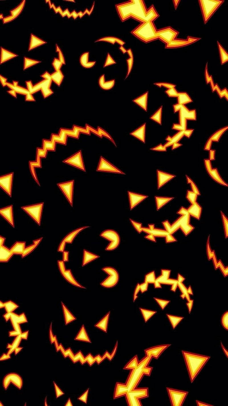 Spooky Pumpkin Faces Halloween Phone Wallpaper