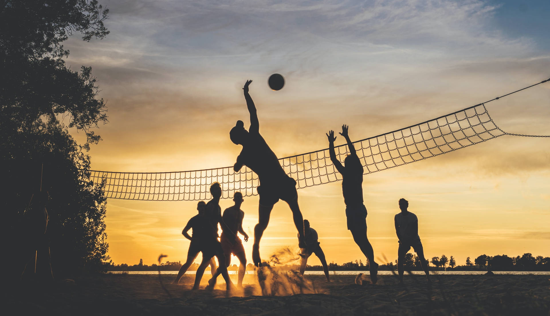 Sport Silhouettes Of Volleyball Players Wallpaper