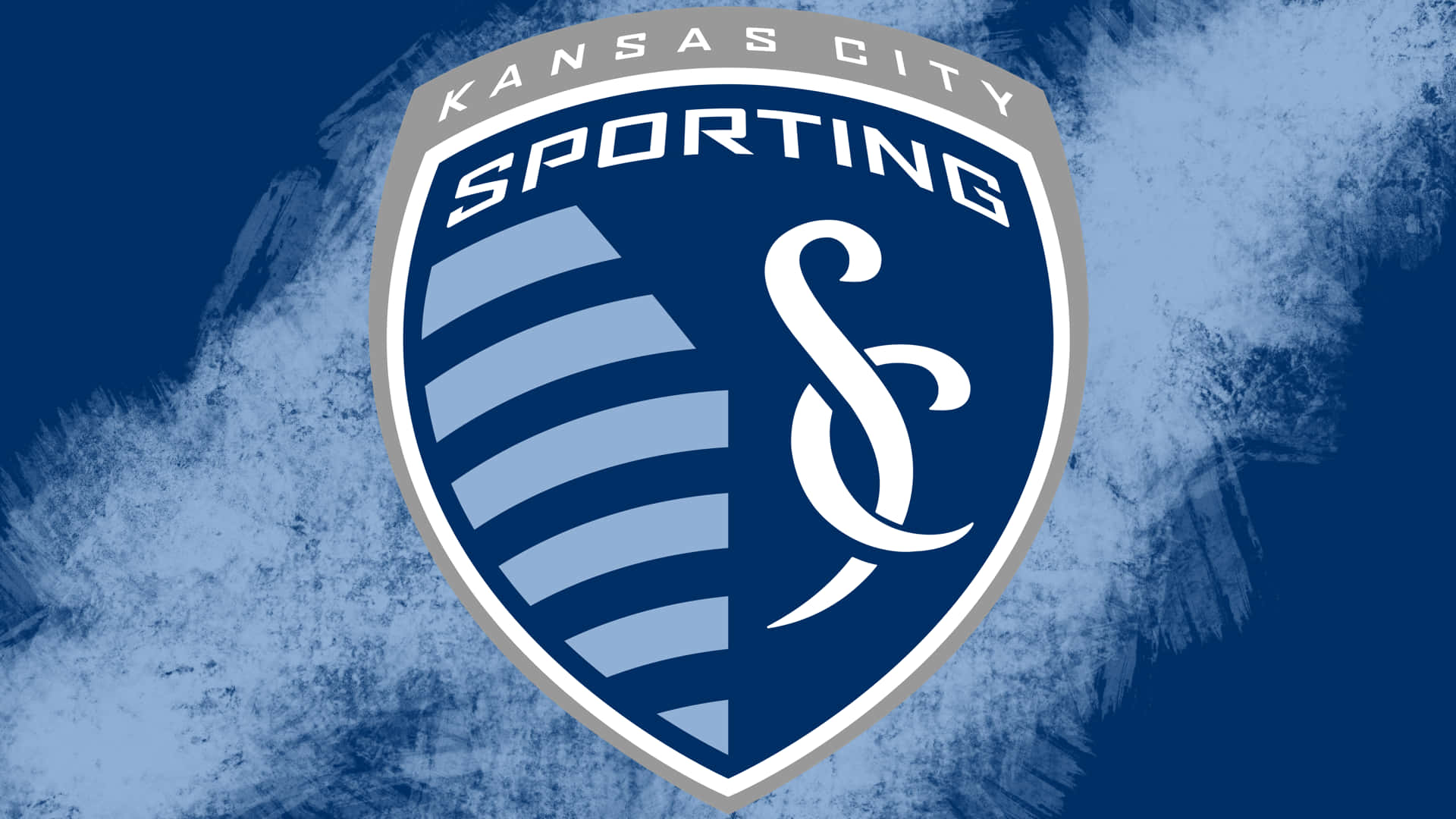 Sporting Kansas City Logo On Blue Backdrop Wallpaper
