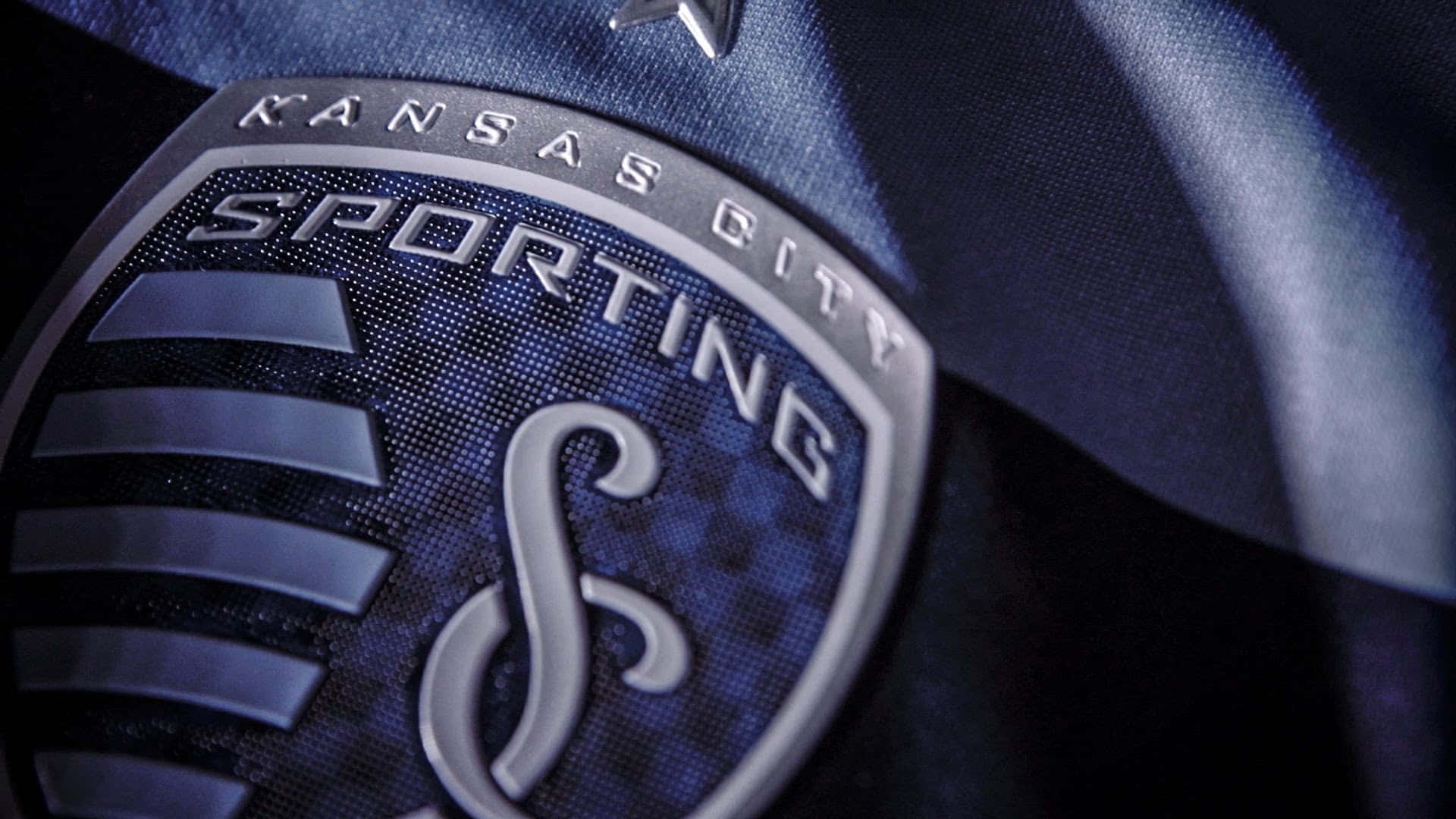 Billede af Sporting Kansas City Logo på blå jersey tapet Wallpaper