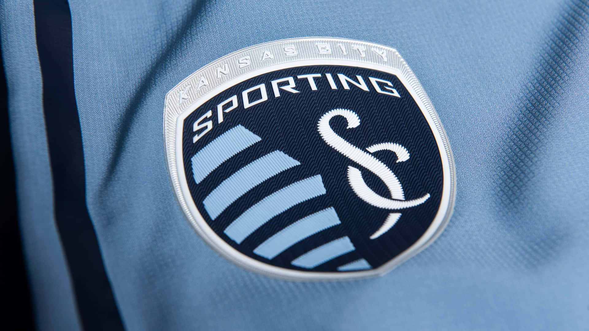 Sporting Kansas City Logo On Jersey Wallpaper