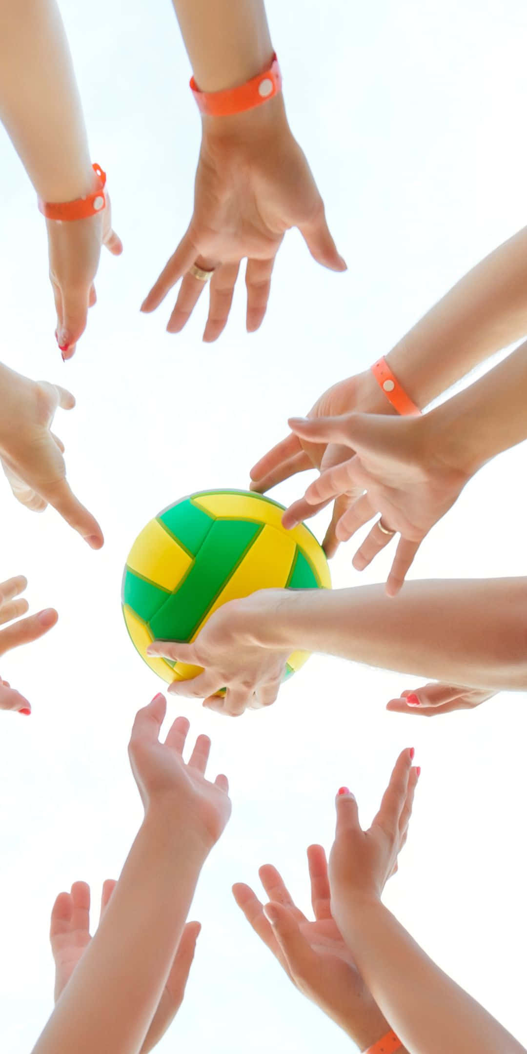 Hands Reaching For Volleyball Sports Background