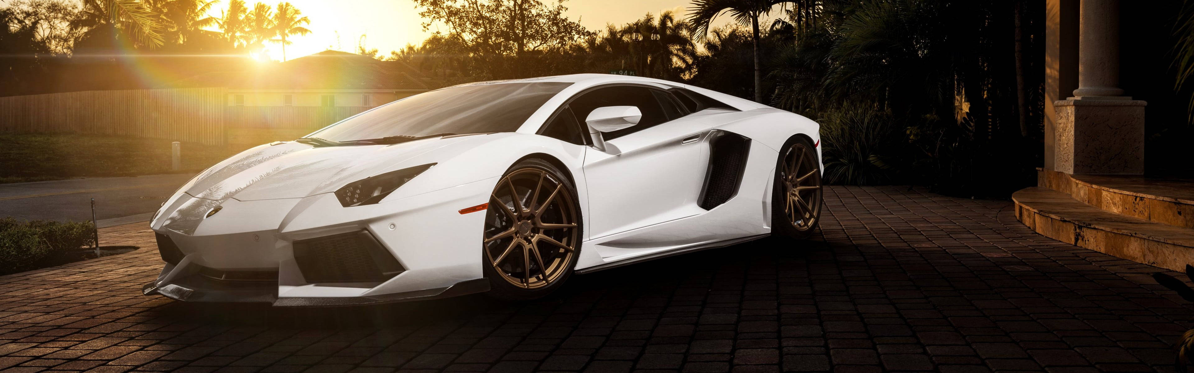 Caption: Unleashed Luxury - Lamborghini Aventador Sports Car Wallpaper