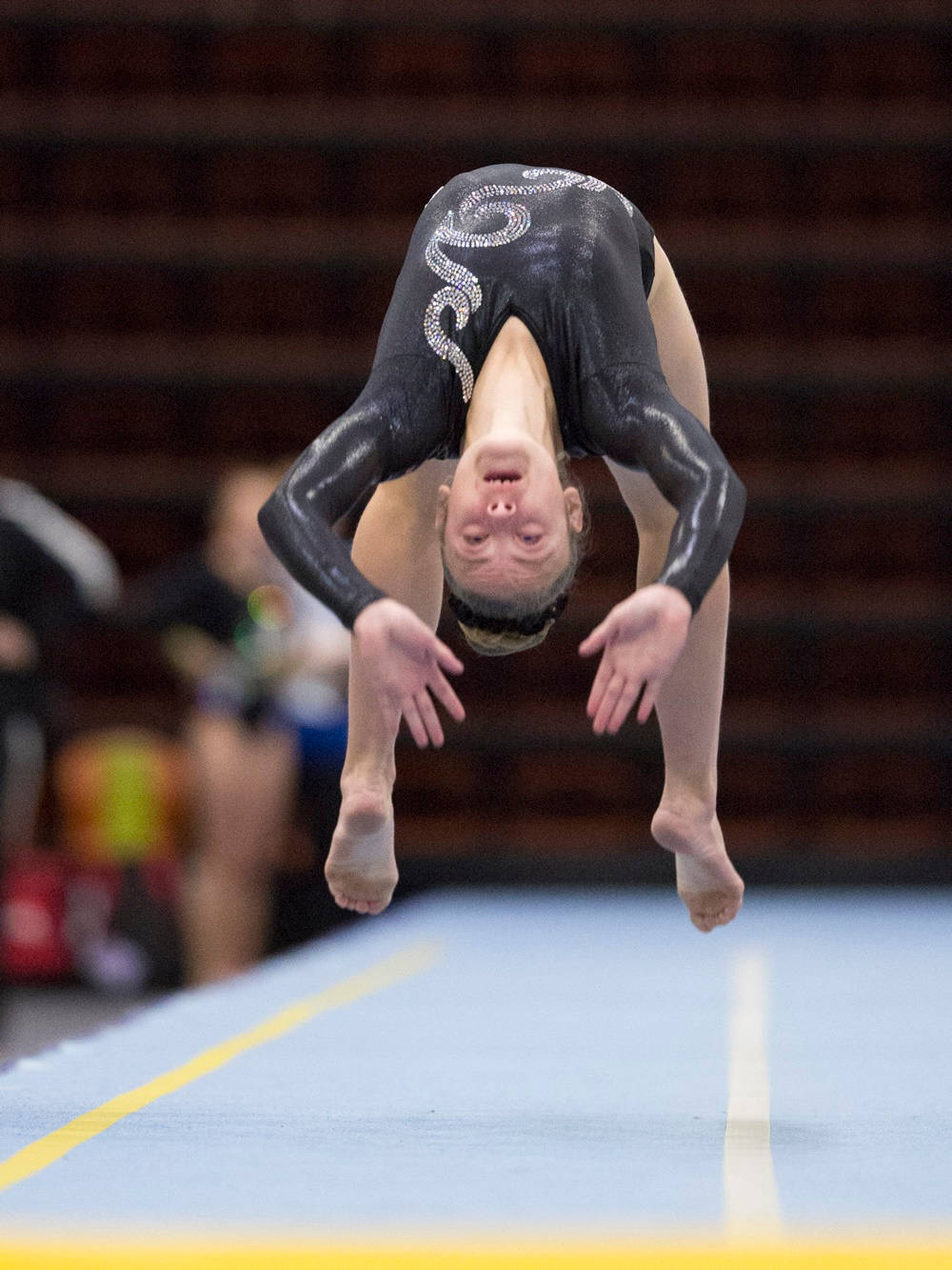 Sports Gymnastics Mid Air Tumbling Jump Wallpaper