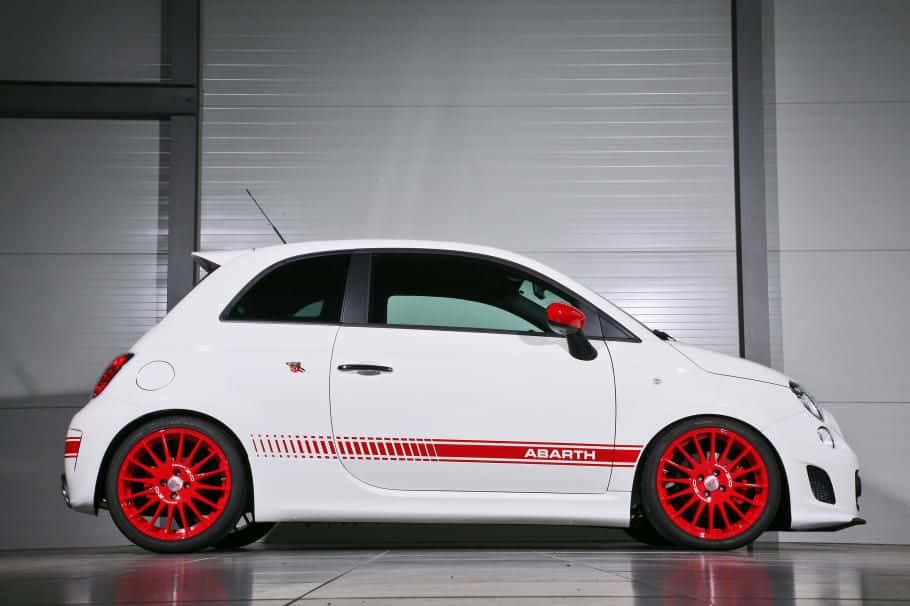 Sporty Abarth 595 Turismo In Red Wallpaper