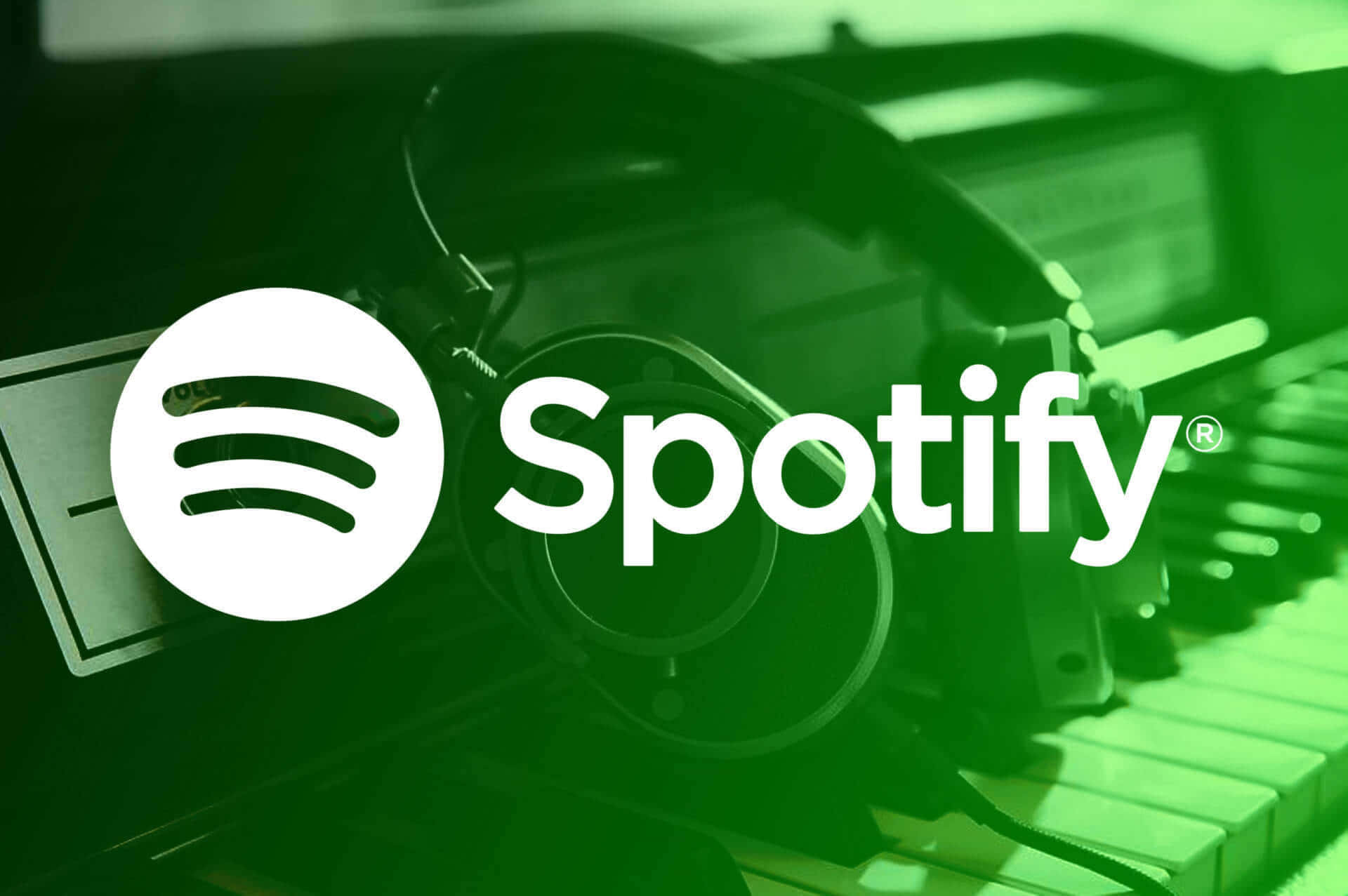 Spotify - A Green Background With Headphones And A Piano