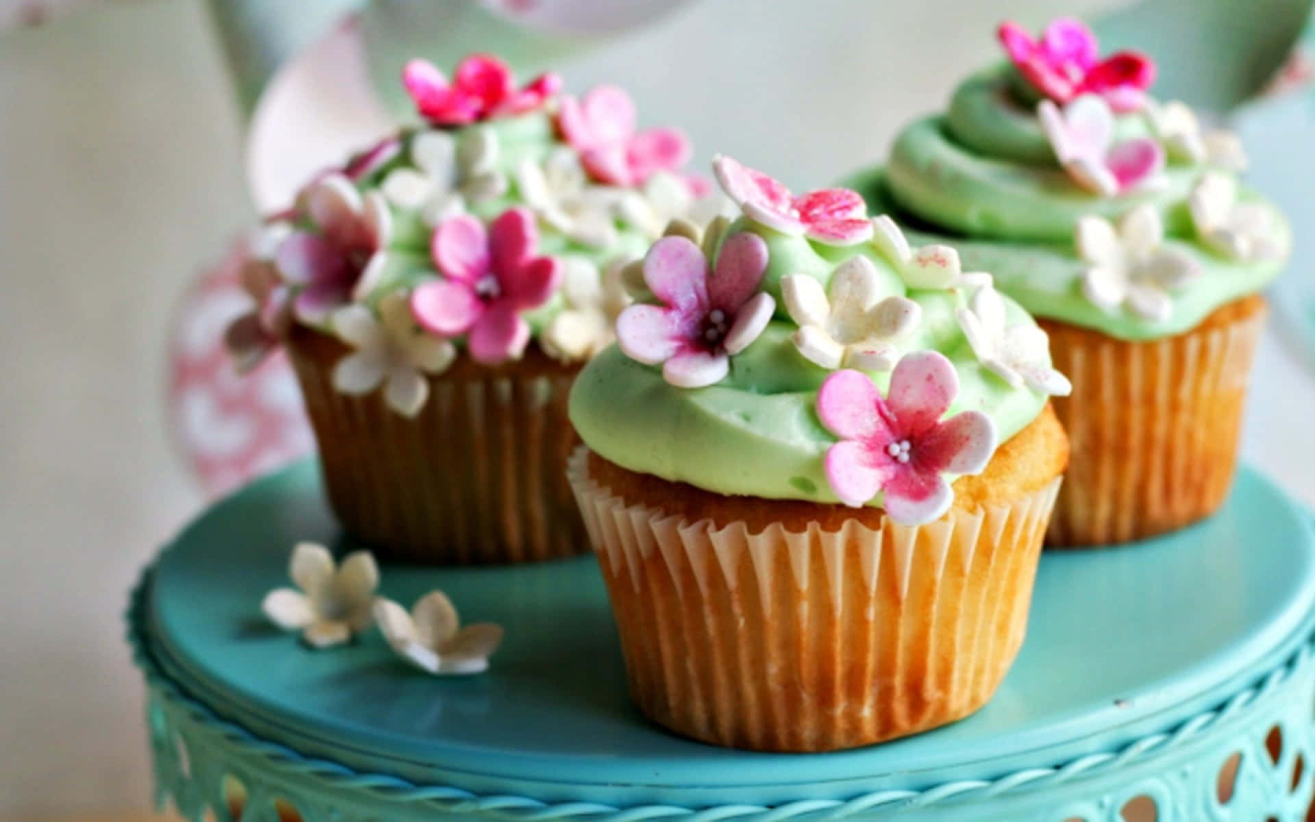 Caption: Delicious Spring Berry Tarts with Fresh Flowers Wallpaper