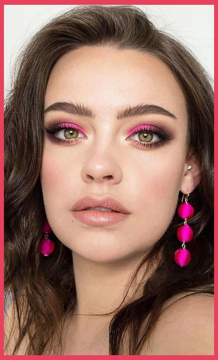 Gorgeous woman flaunting a fresh and vibrant spring makeup look Wallpaper