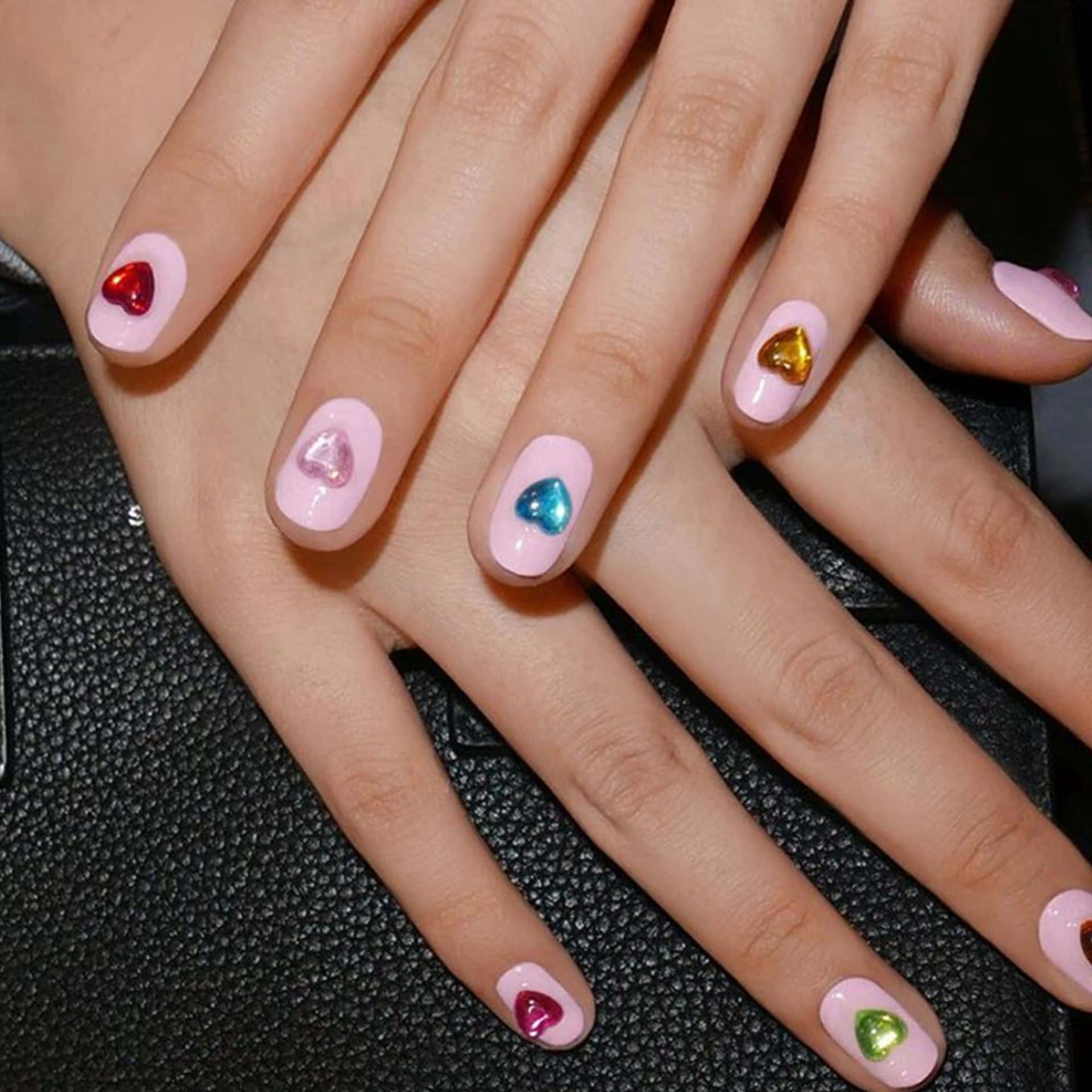 Caption: Vibrant Spring Nails with Floral Design Wallpaper