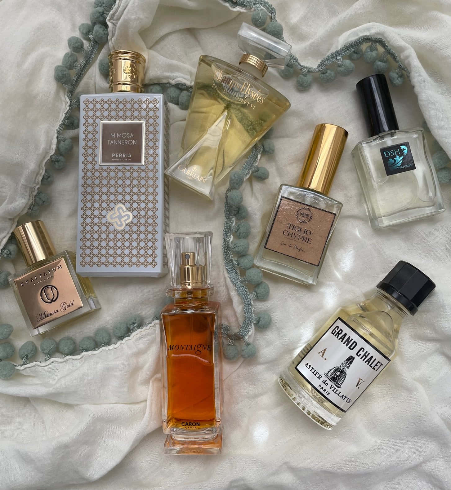 Caption: Elegant Spring Perfume Bottle Wallpaper