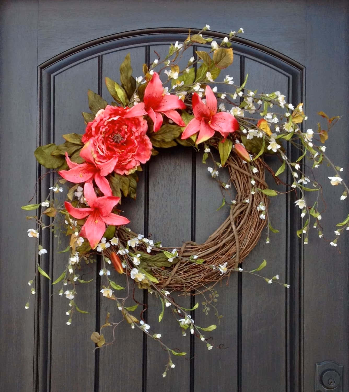 Beautiful Spring Wreath Adorning a Door Wallpaper