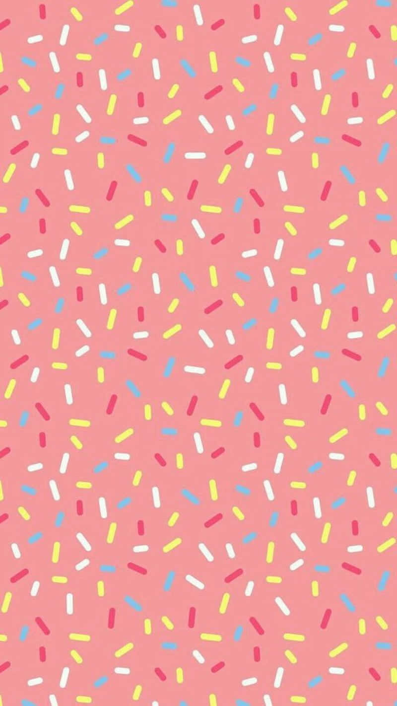 A Pink And Yellow Sprinkles Pattern