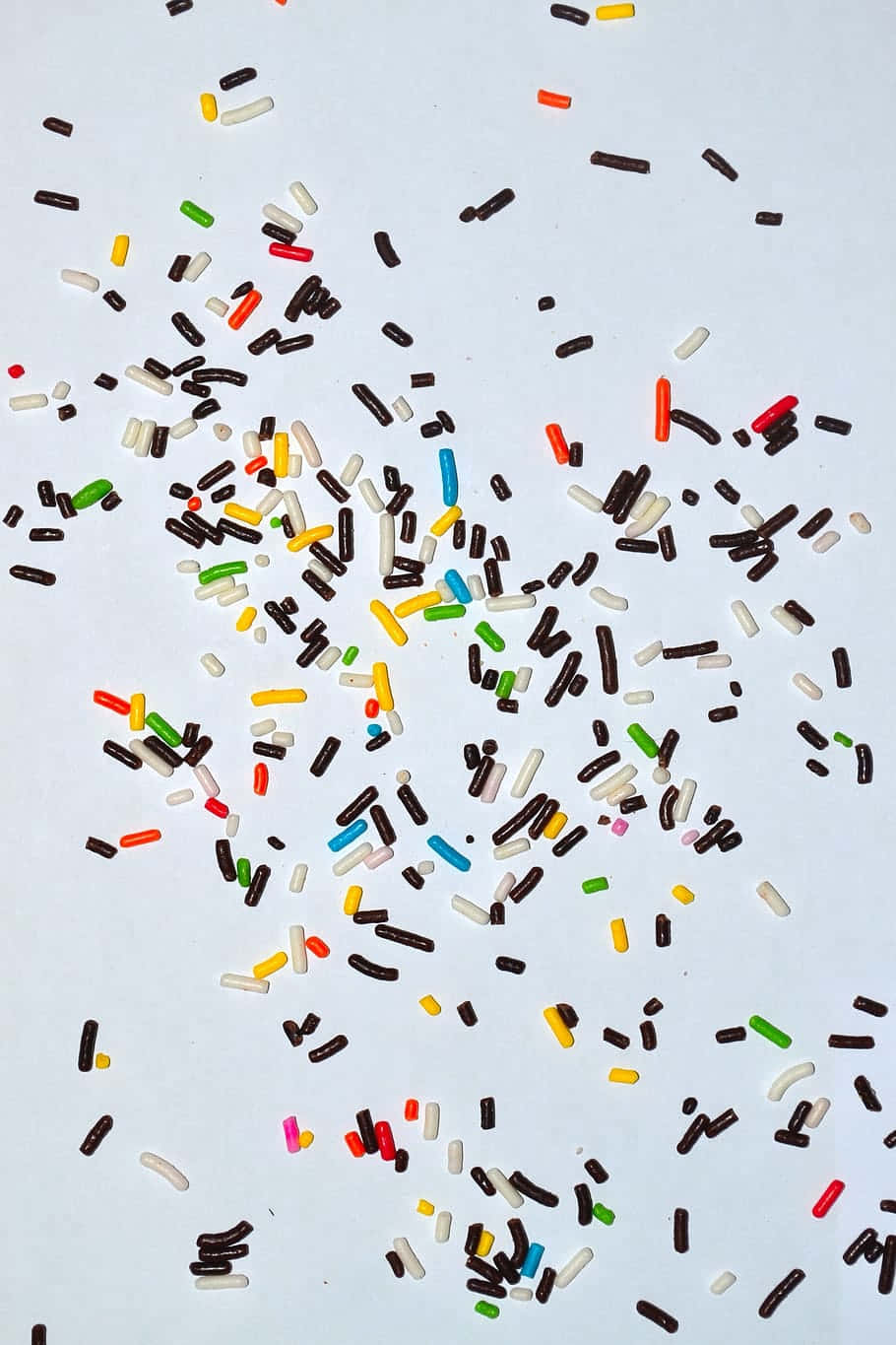 A White Background With Sprinkles