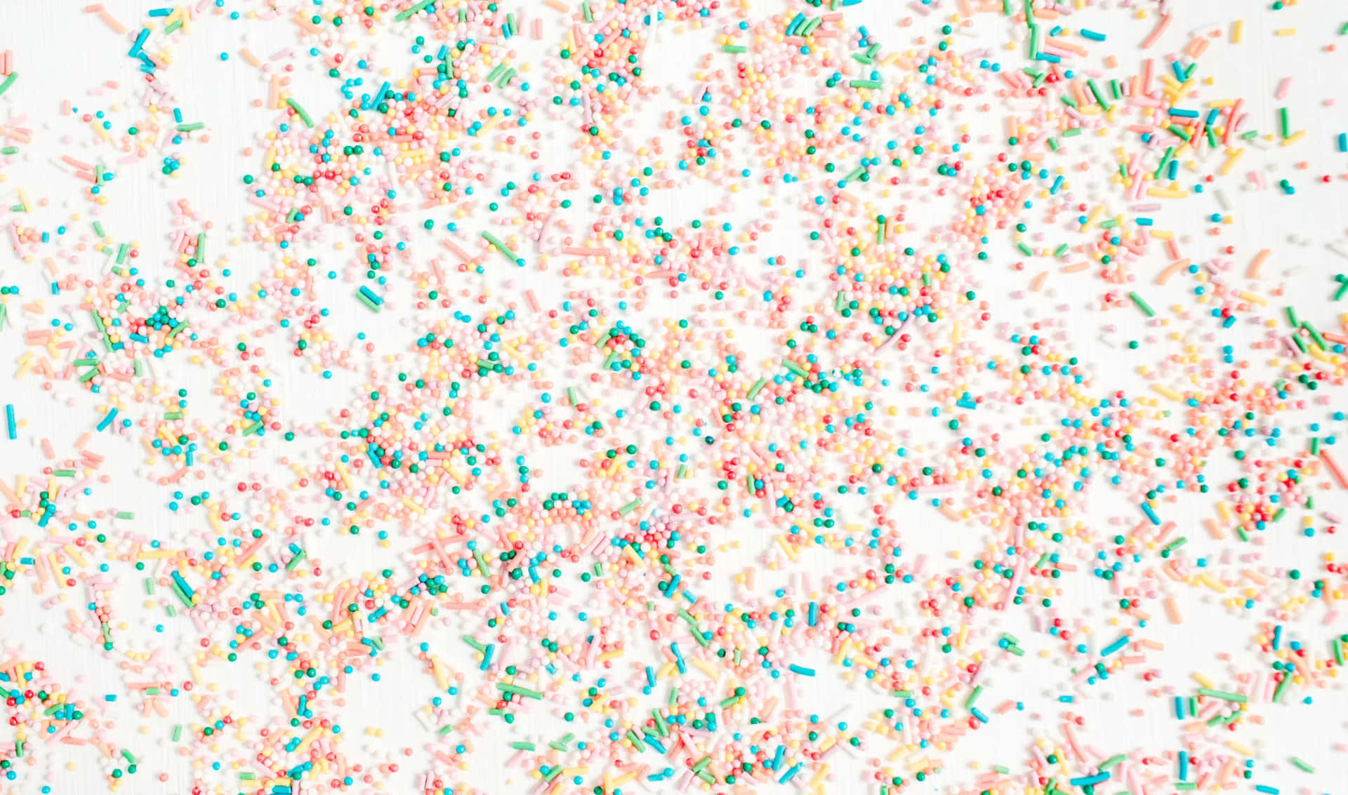 Pink Round Sprinkles On White Background