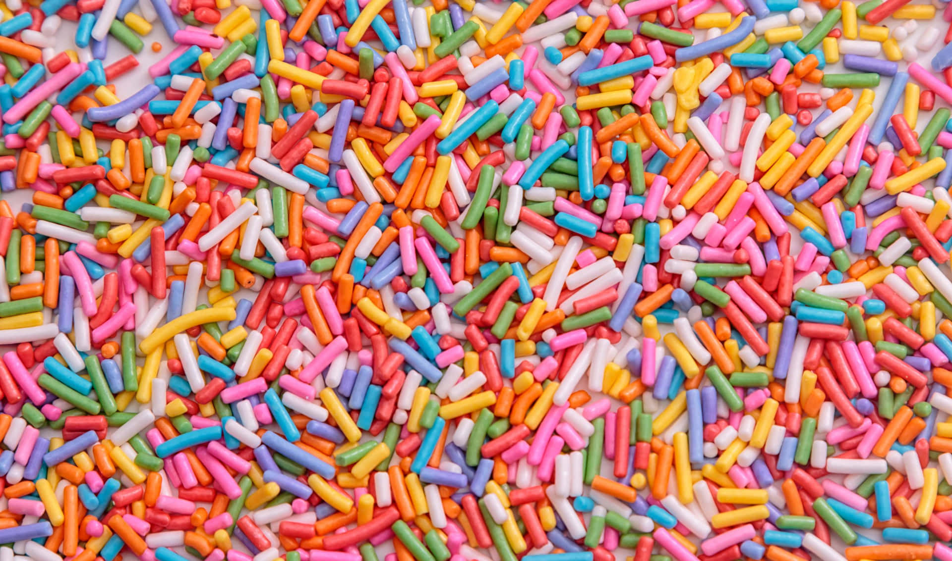 Colorful Sweet Sprinkles Background Design