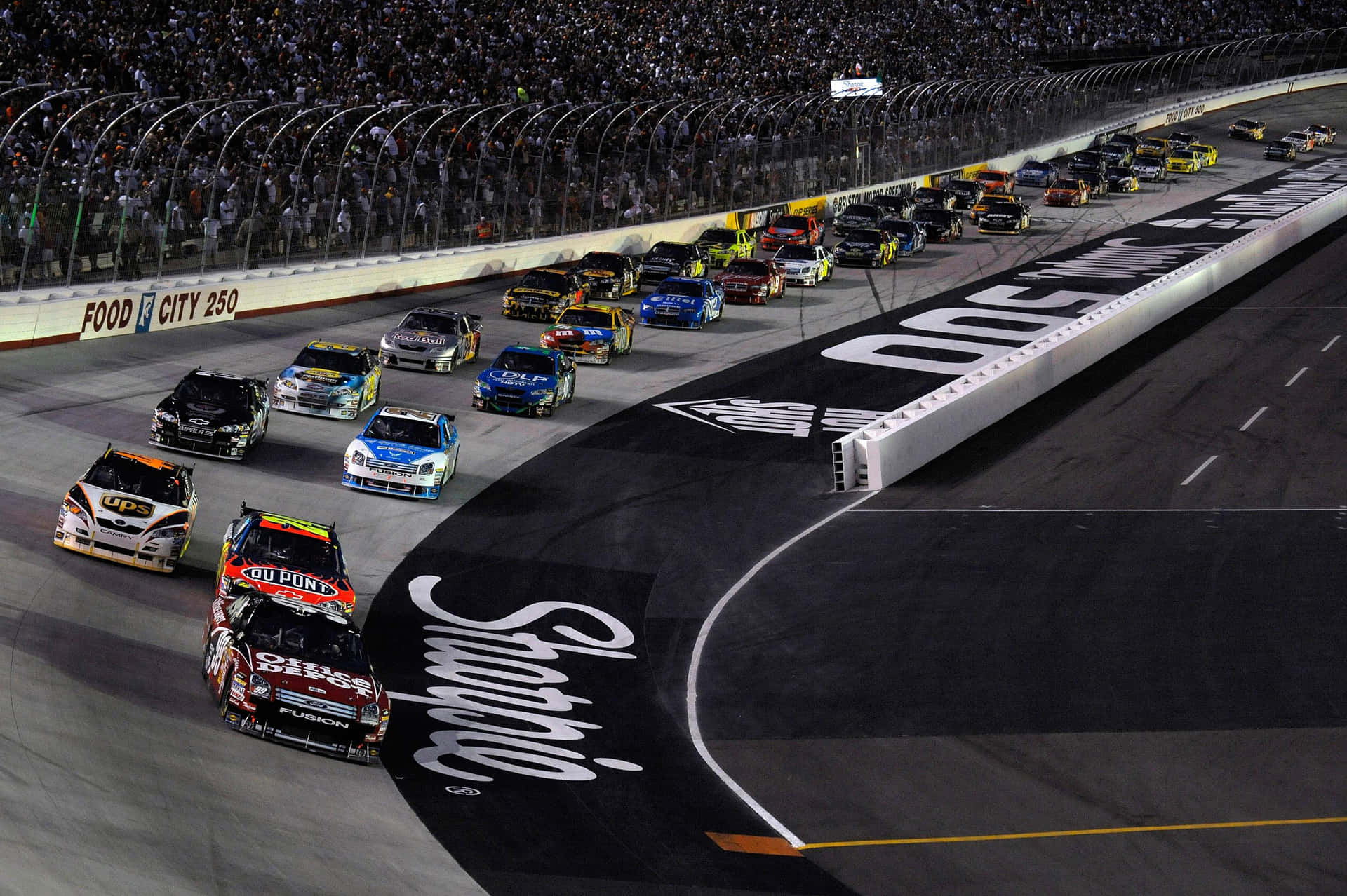 A Nascar Race Is Going On Wallpaper