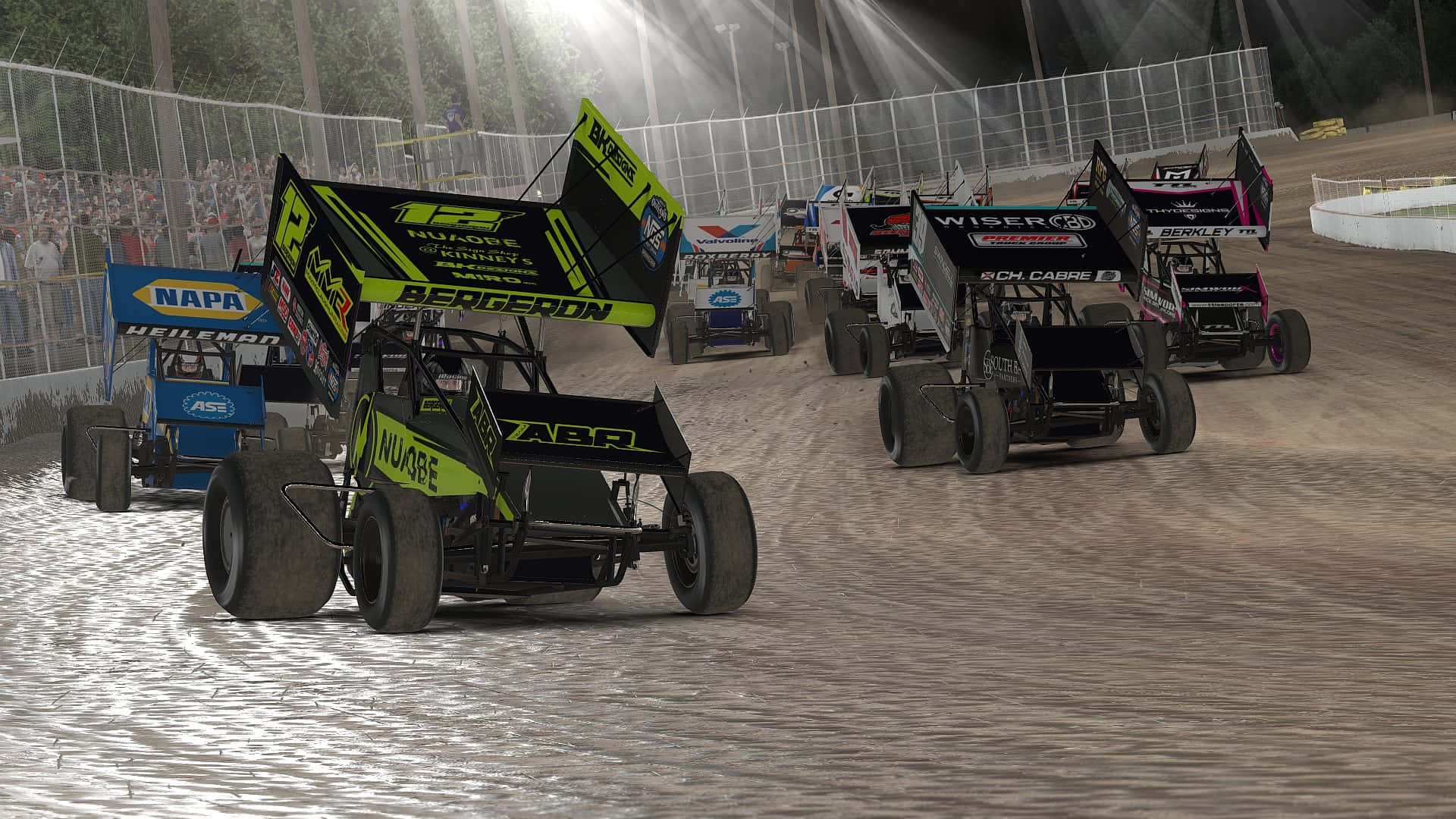 A Group Of Dirt Track Racing Cars Are Racing In The Dirt Wallpaper