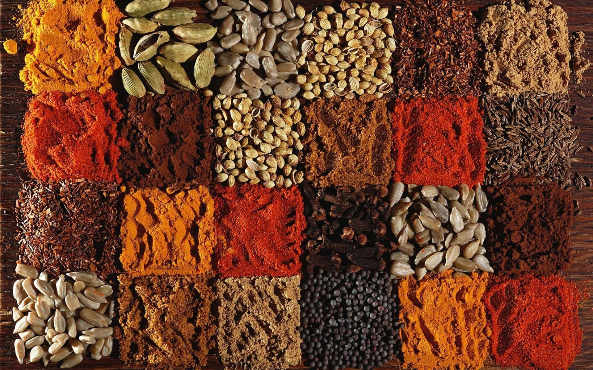 Square Shaped Spices On Wooden Surface Wallpaper