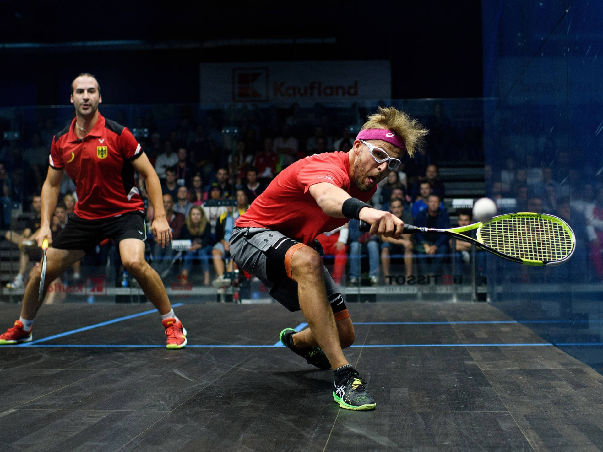 Squash Athletes In Red Background