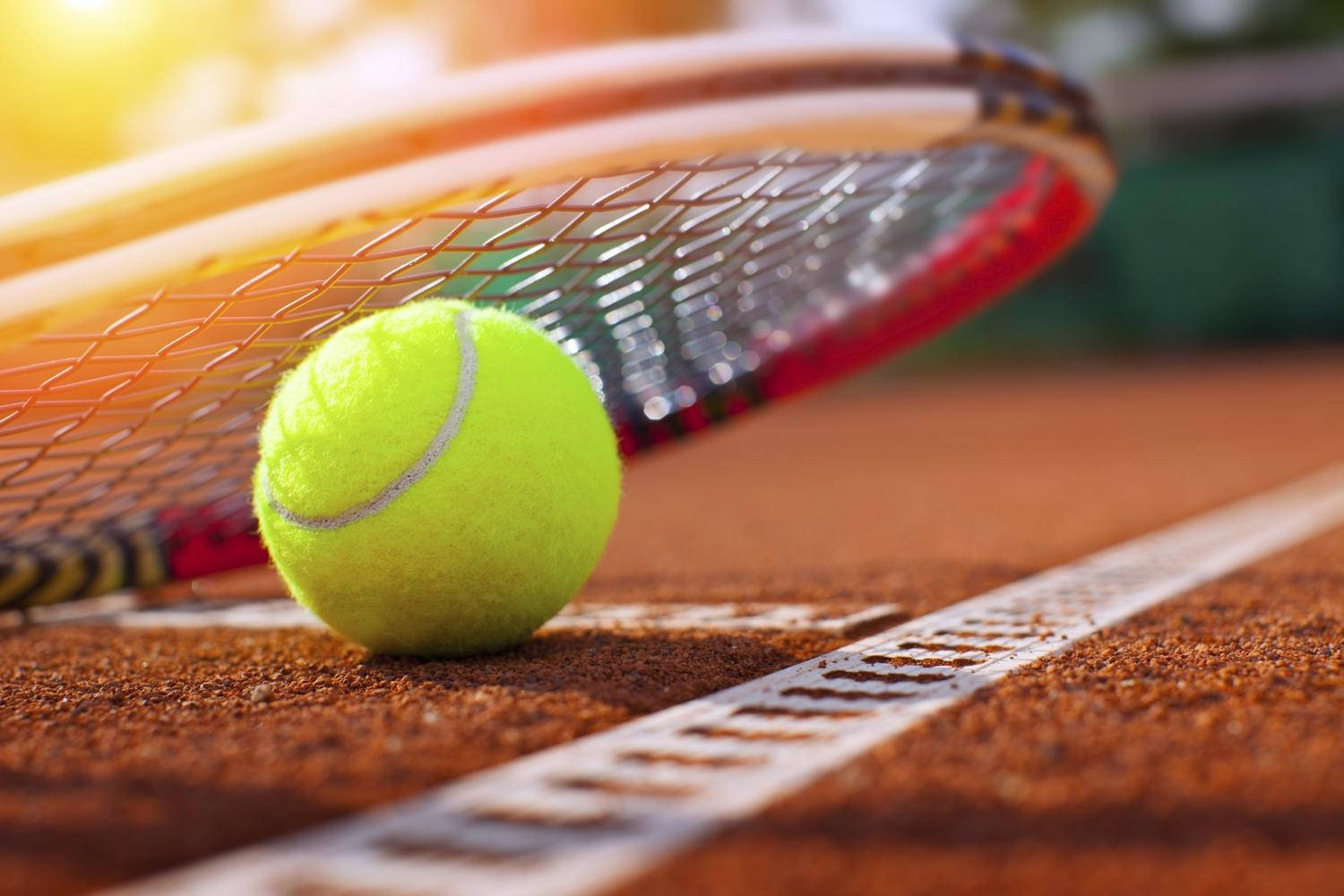 Squash Ball Under A Racket Background