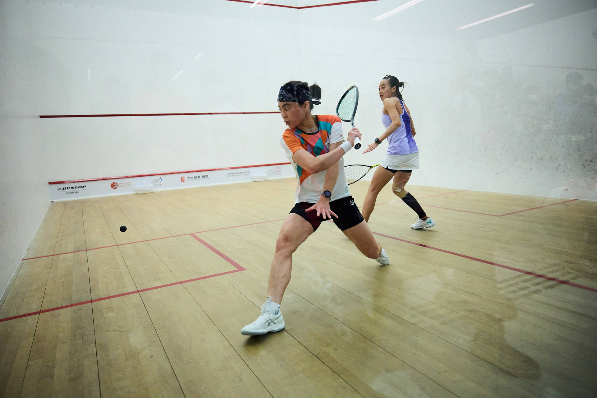 Squash Duo In White Room Background
