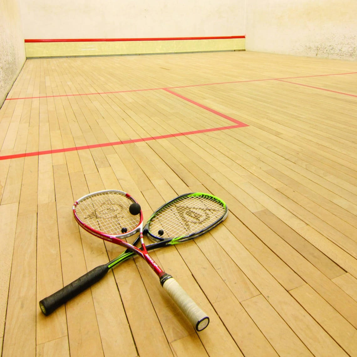 Squash Rackets On Wooden Floor Wallpaper