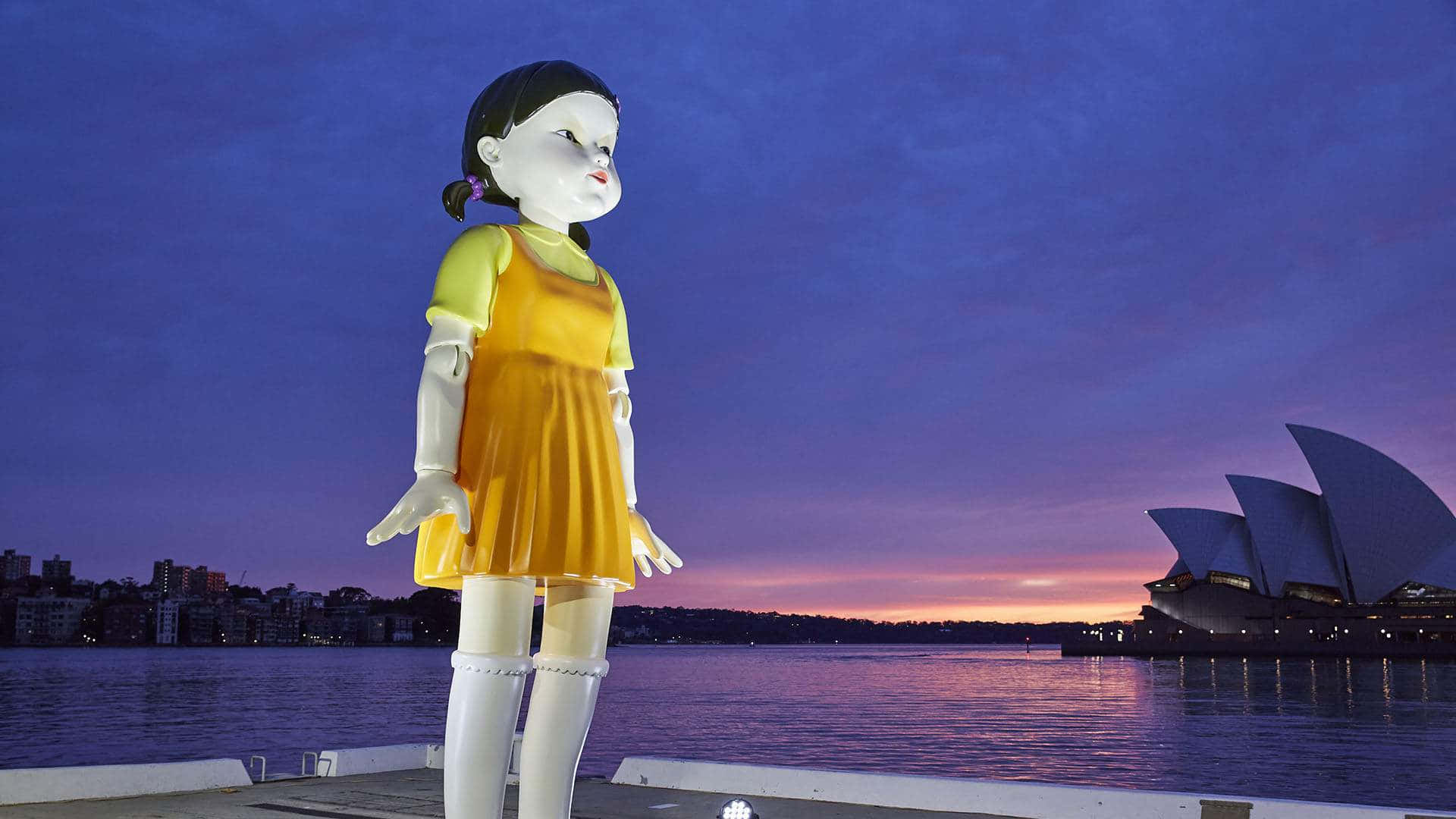 Statue til Sydney Blæksprutte Spil Rødt Lys Grønt Lys Baggrund