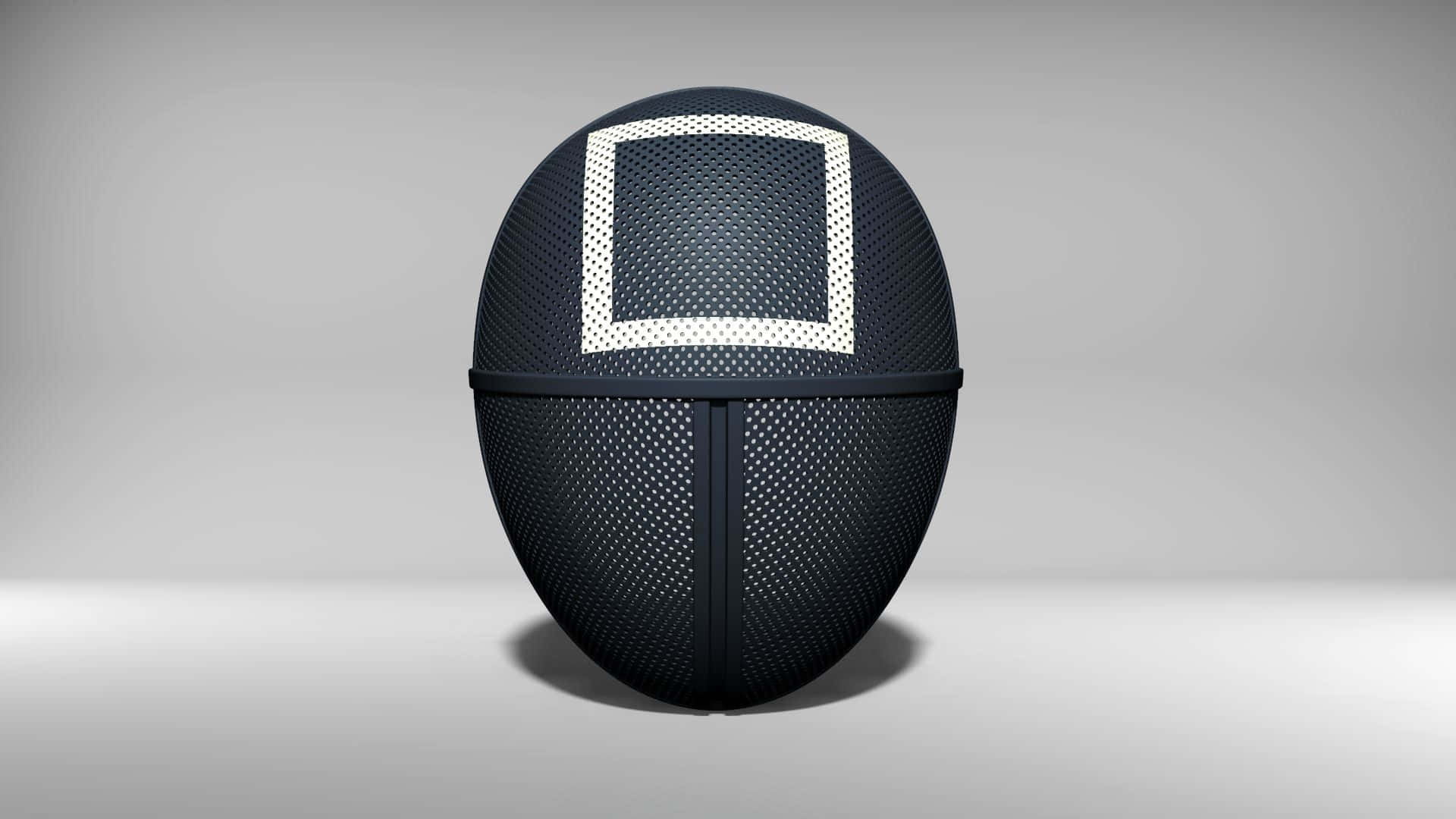 A Black Football With A White Screen On It