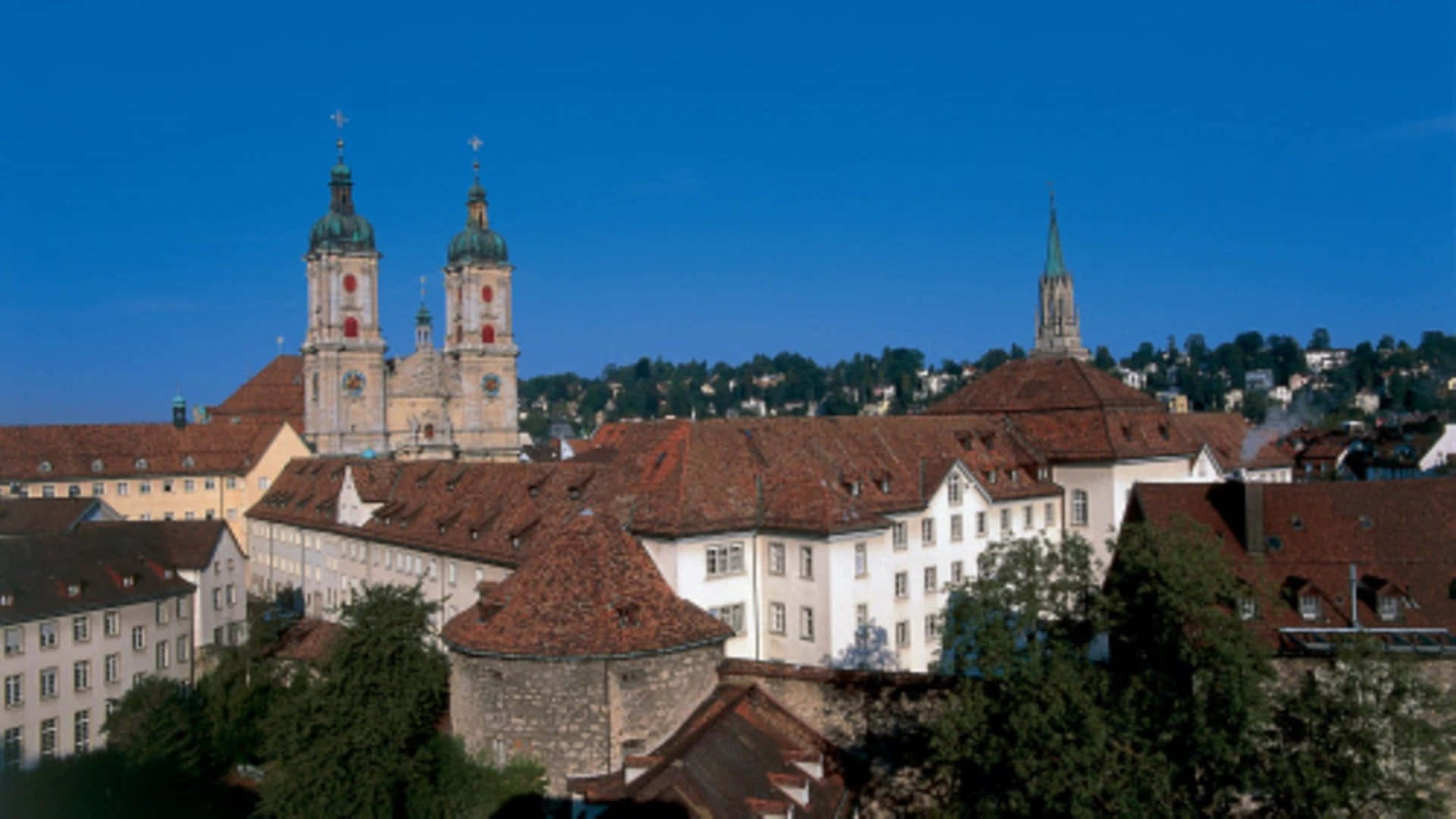 St. Gallen Main Square Bustling With Activity Wallpaper