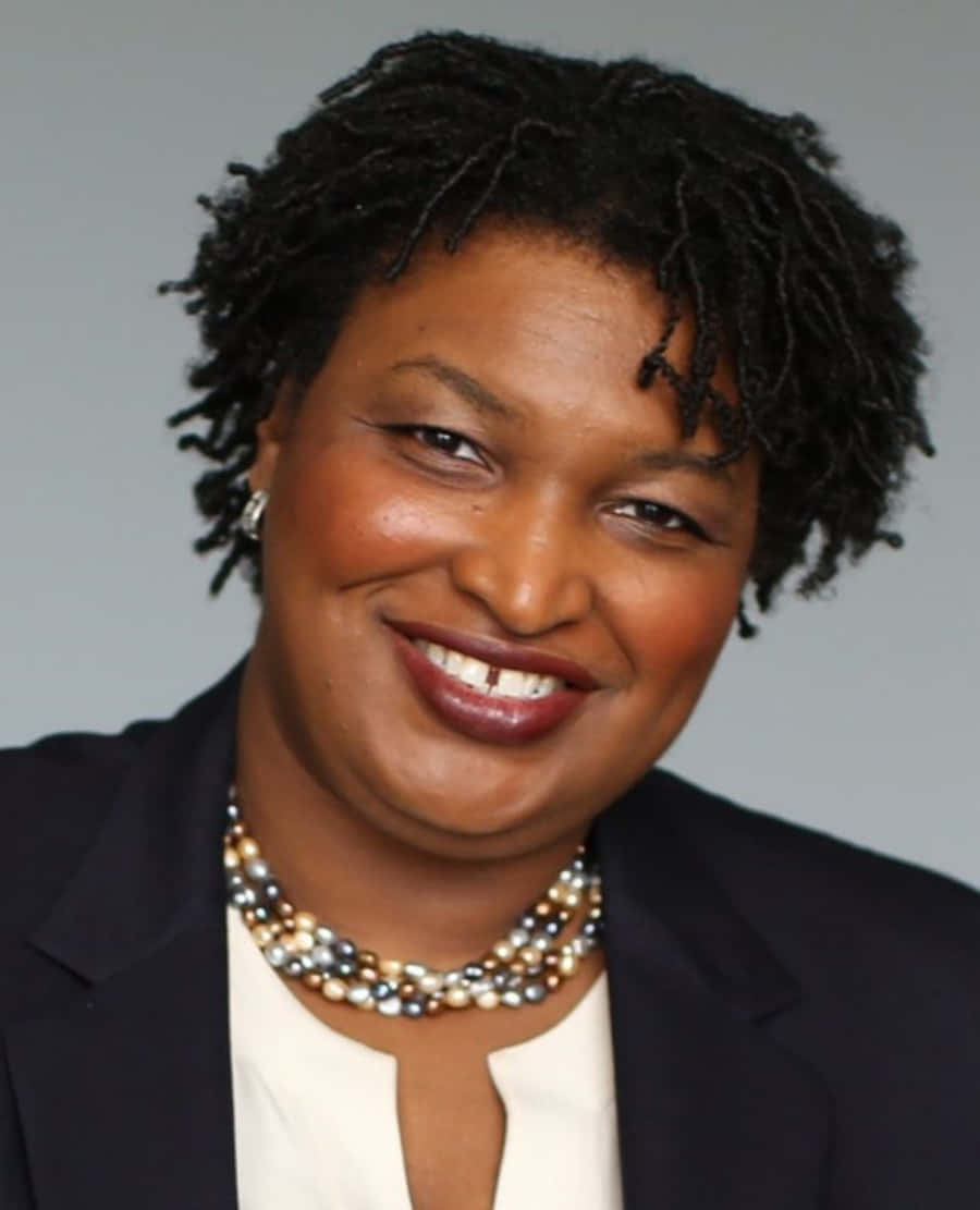 Stacey Abrams Delivering A Powerful Speech Wallpaper