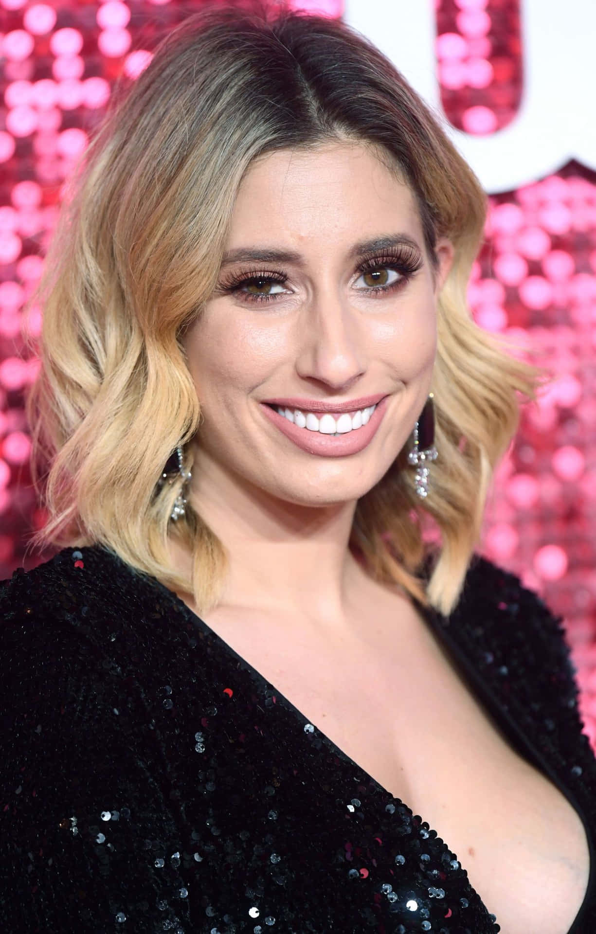 Stacey Solomon Smiling At Event Wallpaper