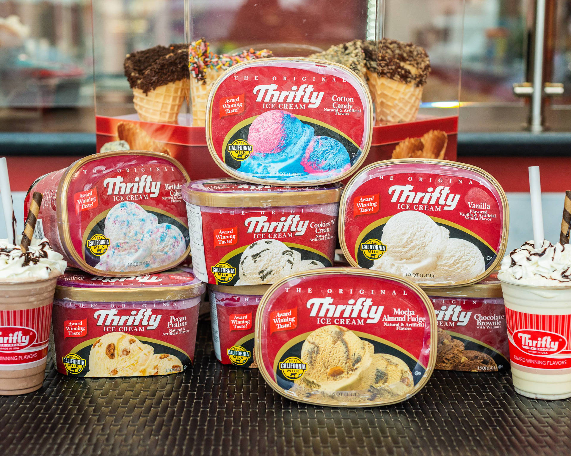 Stack Of Thrifty Ice Cream Tubs Wallpaper