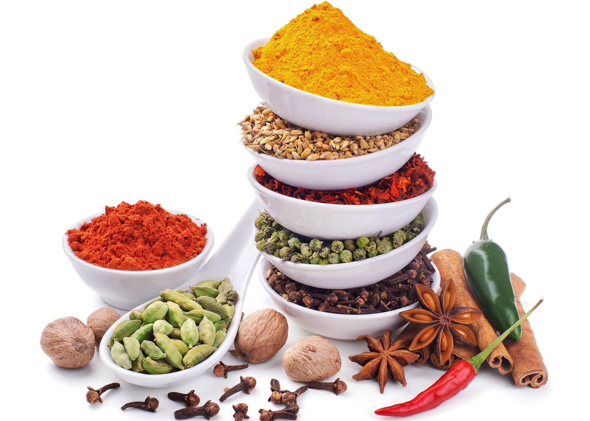 Stack Up Of Spices On Bowls Wallpaper