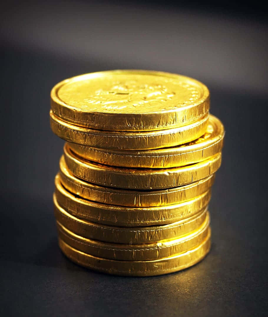Stacked Gold Coin Cents Wallpaper