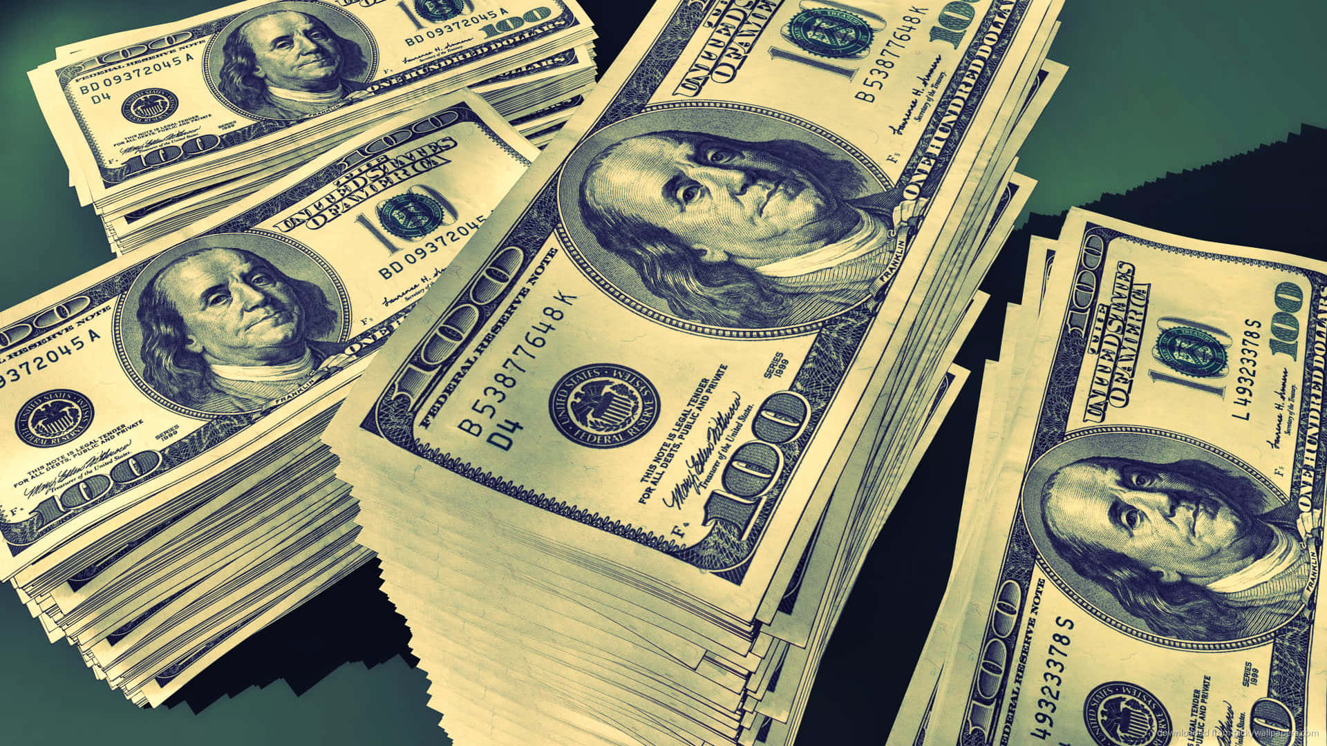 Stabler af hundredvis af dollar sedler i grøn baggrund Wallpaper