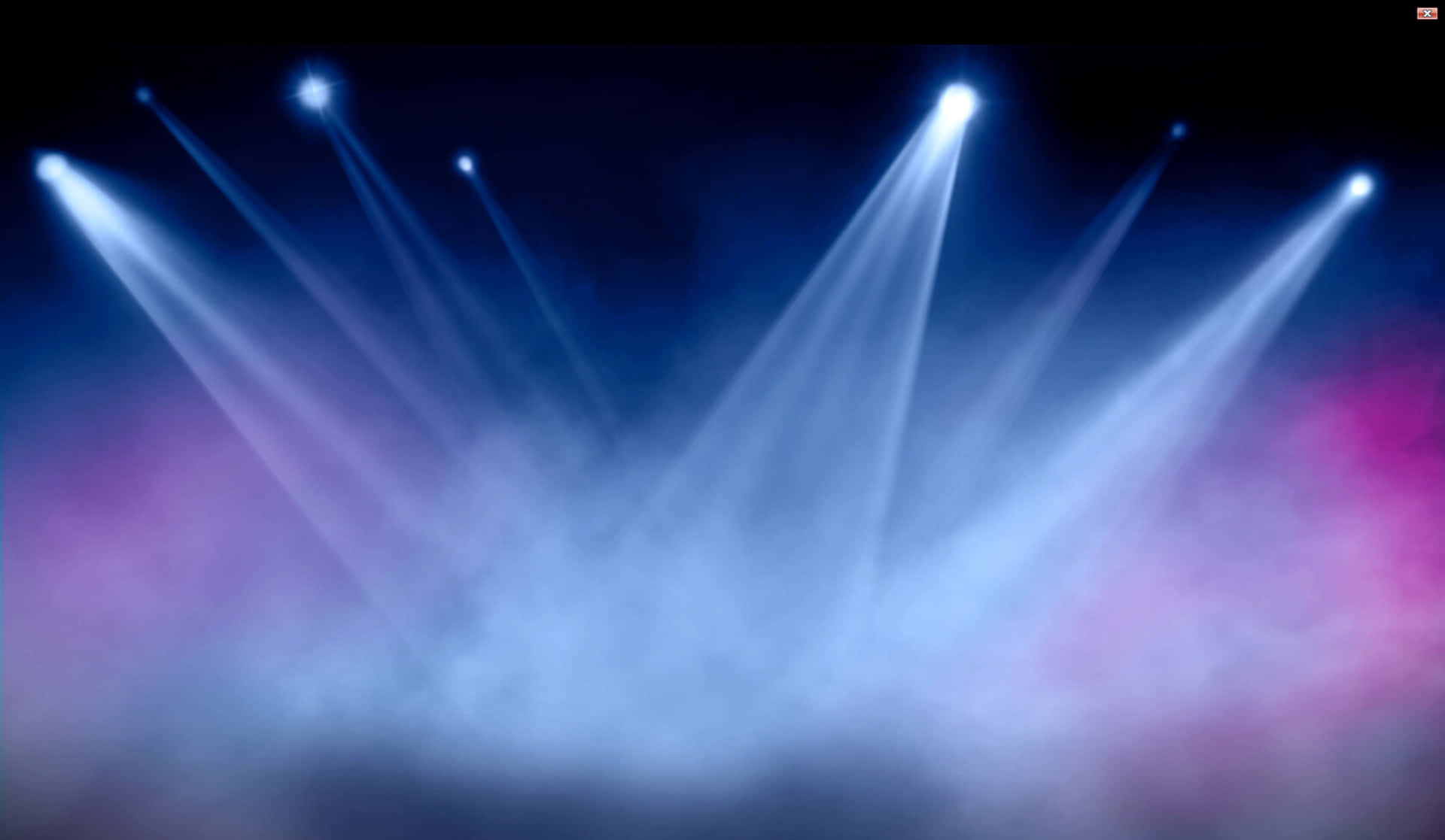 A Stage With Light Beams On The Stage