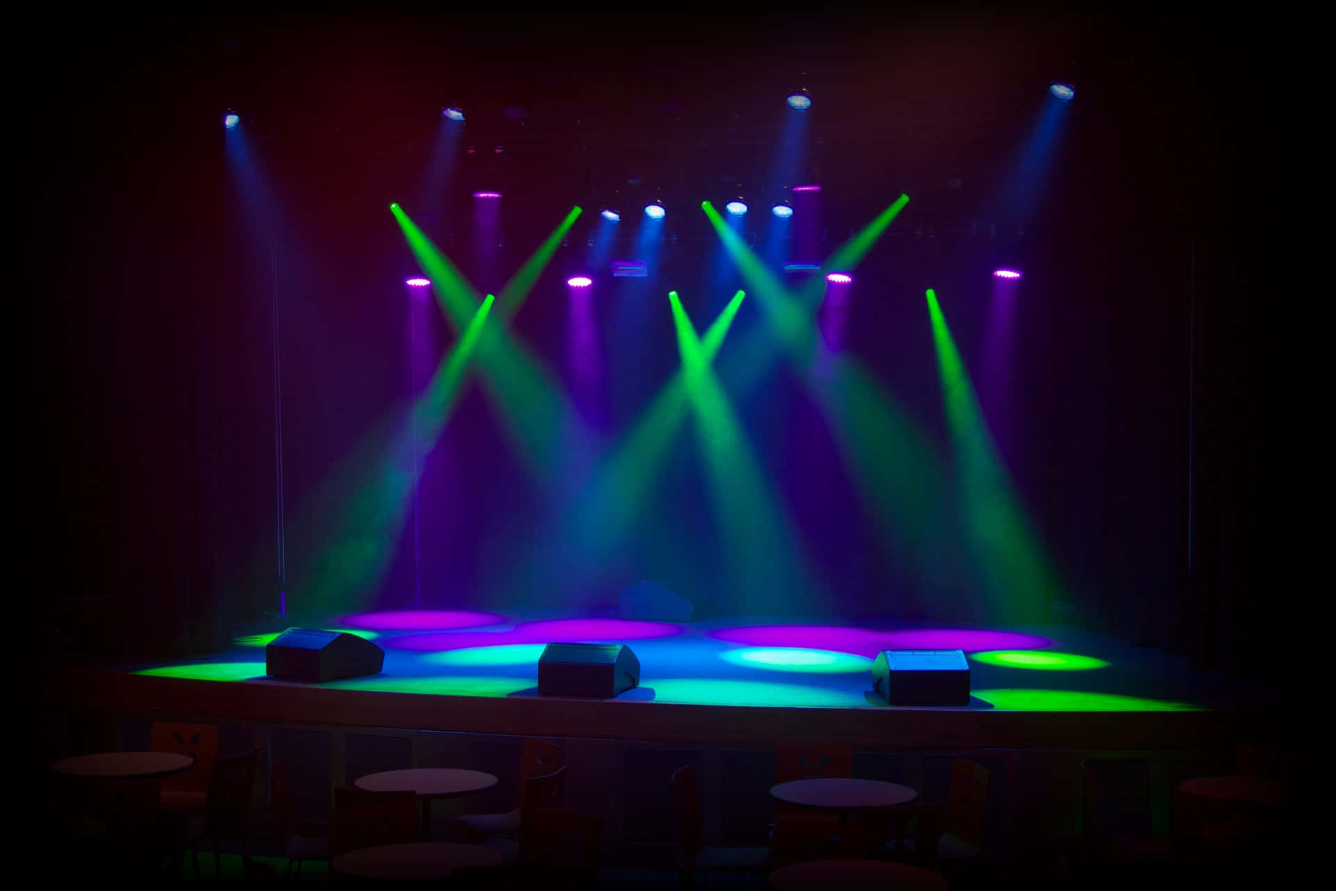A Stage With Colorful Lights And A Stage