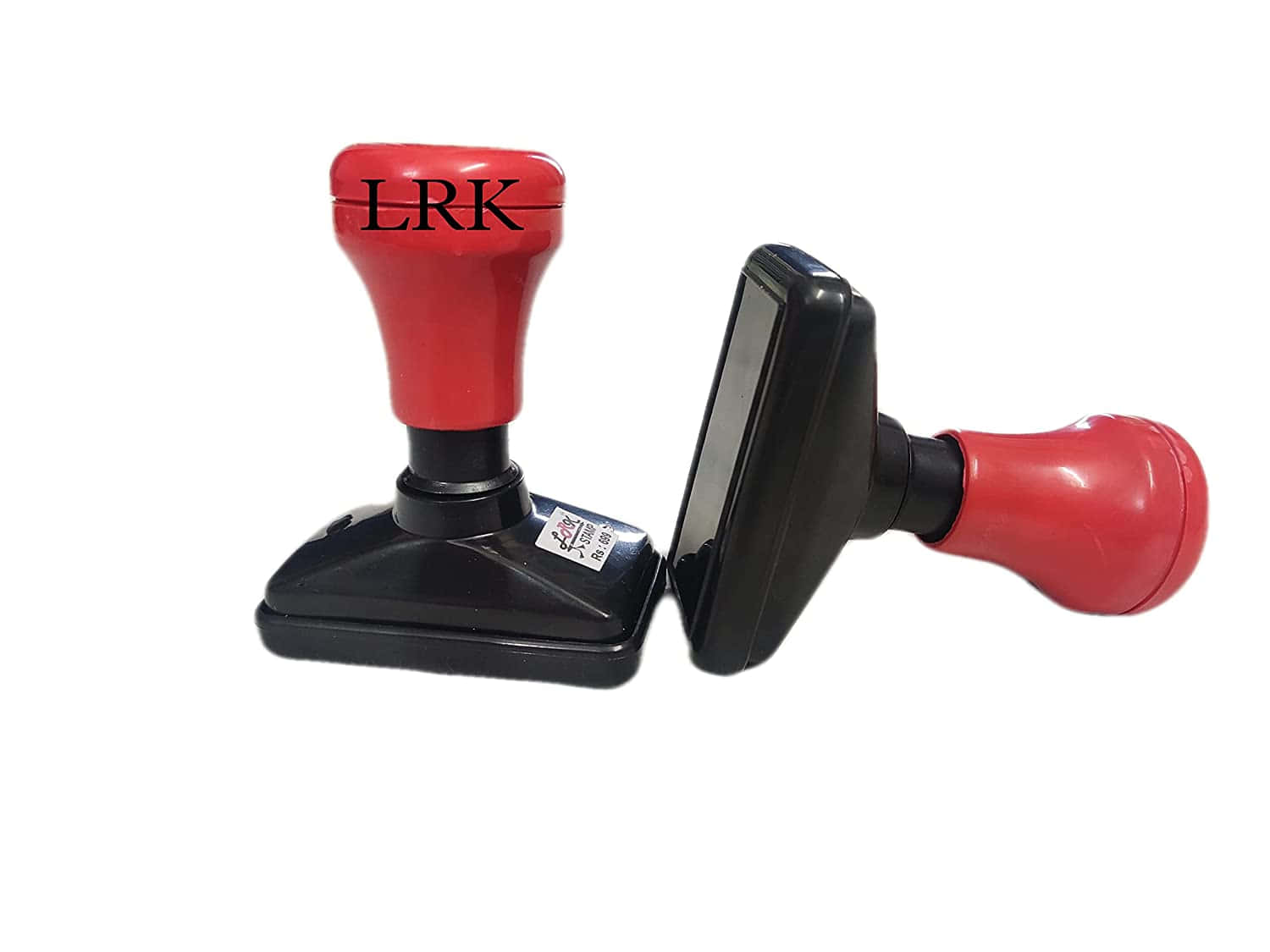 Two Rubber Stamps With The Word Lrk On Them